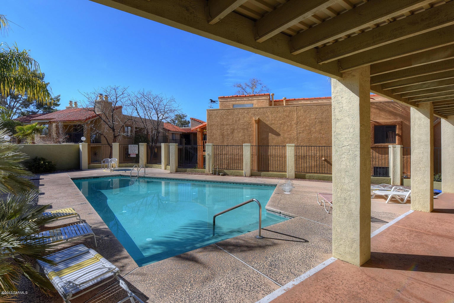 Beautifully remodeled modern condo. Move in ready, and updated which includes new carpeting, paint, updated tile back splash and updated bathrooms. Fireplace included in living area with a separate dining area. Two bedrooms and baths in a split floor plan. Home includes washer and dryer and stainless steel appliances. Inviting pool, spa and club house are included.