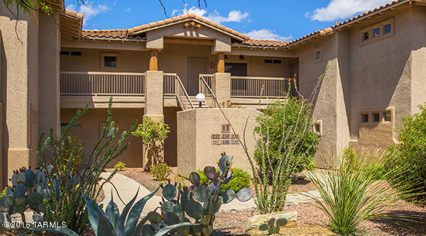 NICE PRIVATE BALCONY OVERLOOKS LUSH DESERT sold turn key- what you see is what you get! This listing includes nice upgrades like stained cabinets, tiled kitchen countertops and newer furniture.  TWO bedroom TWO bath popular Patagonia floor plan with 2 master suites all on one level. 2nd floor with large balcony to enjoy desert views! Adjacent to the Golf Club at Vistoso. Close to Oro Valley Marketplace and Oro Valley Hospital. This floor plan includes a great room with built in media center, and dining area.  The community offers heated pool/spa, nice Clubhouse, gas grill, and exercise facilities (all a short walk away from condo #239). HOA covers trash & recycling, water, Comcast cable credit, streets, landscaping, heated pool all year.  This is your ideal second home or vacation rental