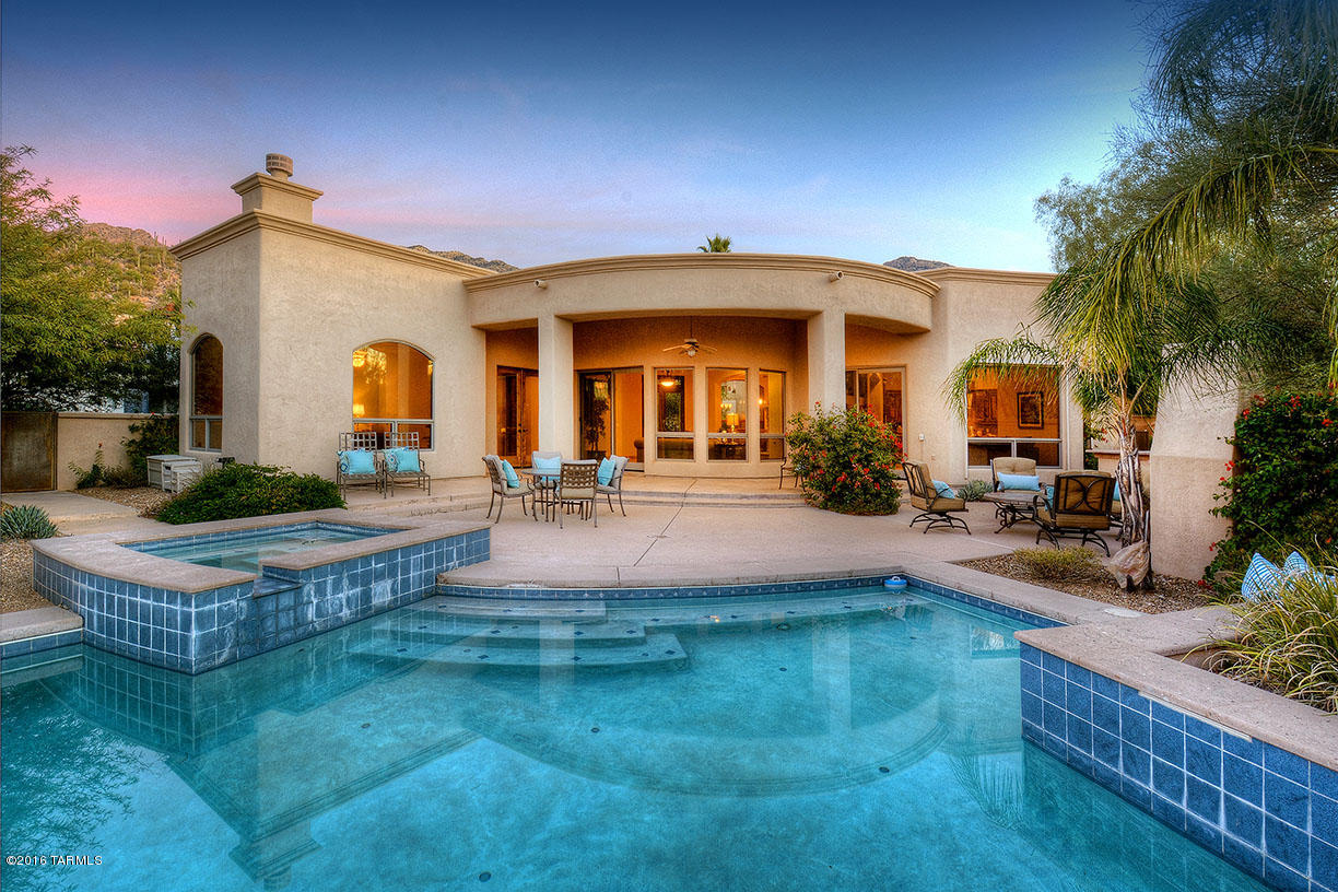STUNNING GENE DEVITIS CUSTOM BUILT SOFT CONTEMPORARY W/CITY VIEWS & HIGH-END FINISHES IN PRESTIGIOUS ALTA VISTA. DRAMATIC FRONT ENTRY W/WROUGHT IRON DOORS & CANTERA FOUNTAIN, EXQUISITE LIVING ROOM W/HIGH CEILINGS & SEE-THROUGH CANTERA STONE FIREPLACE,FORMAL DINING ROOM, GOURMET ISLAND KITCHEN W/ALDER CABINETS,GRANITE COUNTERTOPS,TOP OF THE LINE APPLIANCES INCL. DCS GAS RANGE,SUB ZERO. 8FT. ALDER DOORS,WOOD CLAD WINDOWS, TRAVERTINE TILE FLOORS, 4 BEDROOMS PLUS STUDY OR 5 BEDROOMS, 3 ½ BATHS, MASTER SUITE W/SITTING AREA; LUX BATH W/TRAVERTINE, WALK IN CLOSET & PRIVATE ENTRY TO REAR PATIO. FABULOUS BKYD W/COVERED PATIO, POOL, SPA, FIREPLACE, BBQ, LUSH LANDSCAPING,3 CAR GARAGE,DIST.16 SCHOOLS AND CITY VIEWS.FLOOR PLAN LOCATED UNDER PHOTOS, VIRTUAL TOUR.