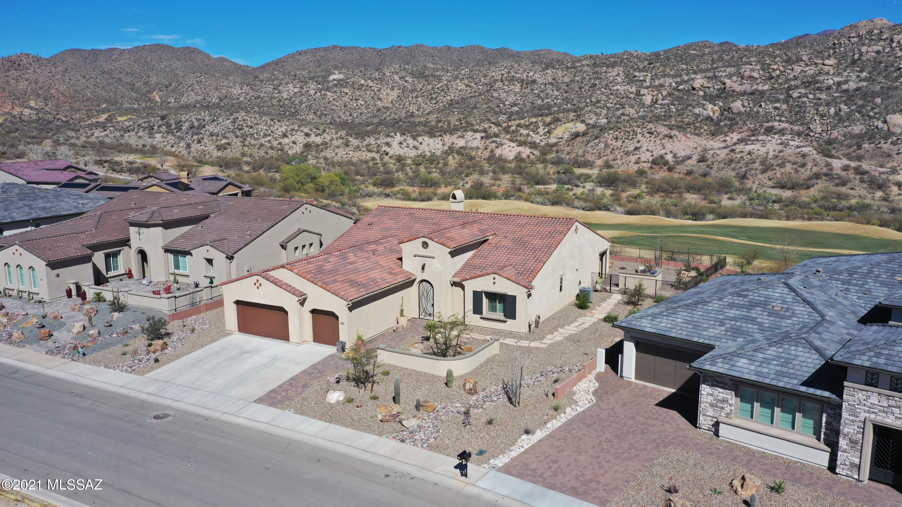 Stunning Bacara Model in The Preserve at Saddlebrooke in a Private & Peaceful Setting with Unobstructed Catalina Mountain & Golf Course Views from Inside & Out. Chef's Kitchen with Gorgeous Slab Granite Counters, High-end Appliances, 48'' Gas Cooktop, Double Ovens, Sub-Zero Refrigerator, Massive Center Island with Breakfast Bar, Walk-in & Butler's Pantries. Dining Area with Views. Open Great Room with Inviting Fireplace. Master Suite with Huge Walk-in Closet with Custom Built-ins. Elegant Master Bath Walk-in Shower & Double Sink Vanity. Guest Suite with Ensuite Bath. Den, Powder & Laundry Room. Extended 3-Car Garage. Resort Quality Outdoor Living Space with Covered Porch, Extended Paver Patios, Built-in BBQ, Professional Landscaping & Sweeping Catalina Mountain Views. Simply Meticulous.