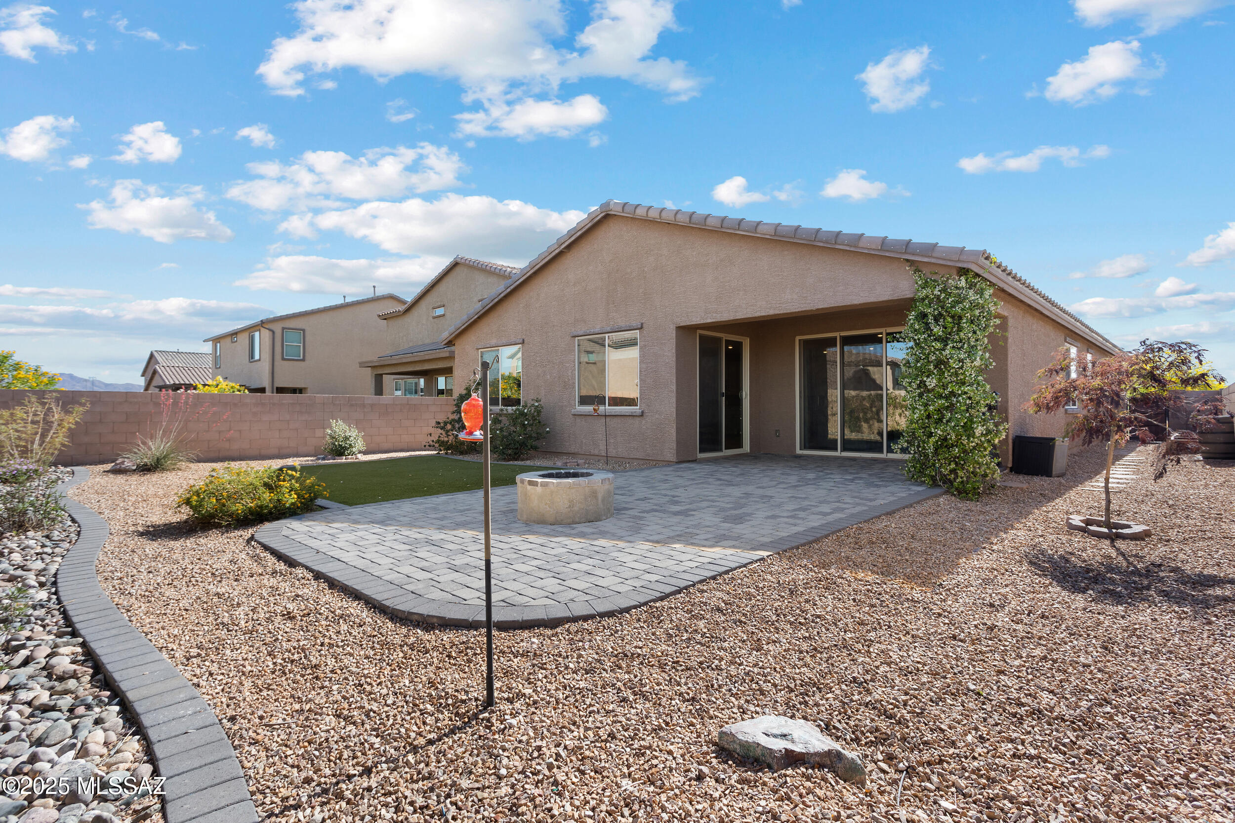 MOVE IN READY HOME on corner lot with  mountain views! SELLER IS OFFERING UP TO 3.5% OF SALES PRICE TOWARDS CLOSING COSTS/2-1 RATE BUY DOWN. Upgrades include gourmet kitchen with gas cook top stove and double wall ovens. Backyard with extended paver patio, fire pit, and turf surrounded by vegetation. 3 bedroom split floor plan with a den and a 2.5 garage for storage. \. Located in the gated community of Rincon Knolls in the Vail School District. VA assumable loan at a 2.5% rate.