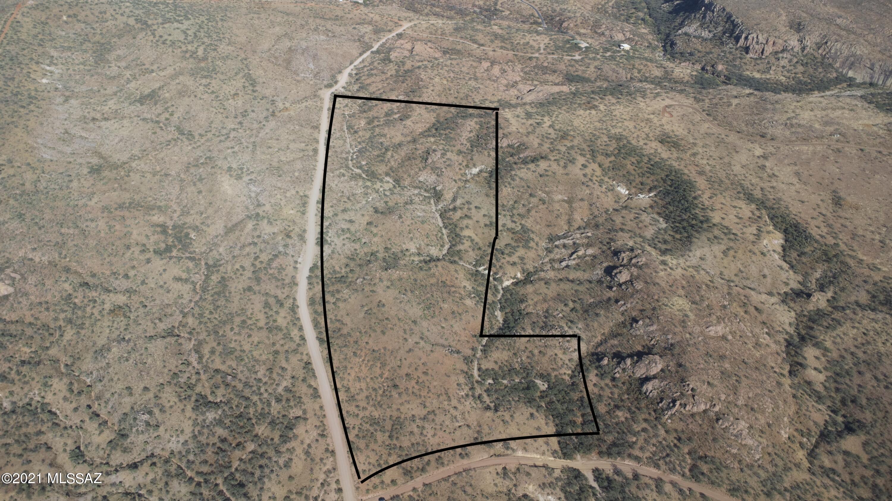 Beautiful 36 acre lot in Tubac Foothills Ranch. Come build your dream ranch home and enjoy the beautiful scenery that surrounds you. Lot will need Well and septic installed. Please check out the aerial drone pictures.