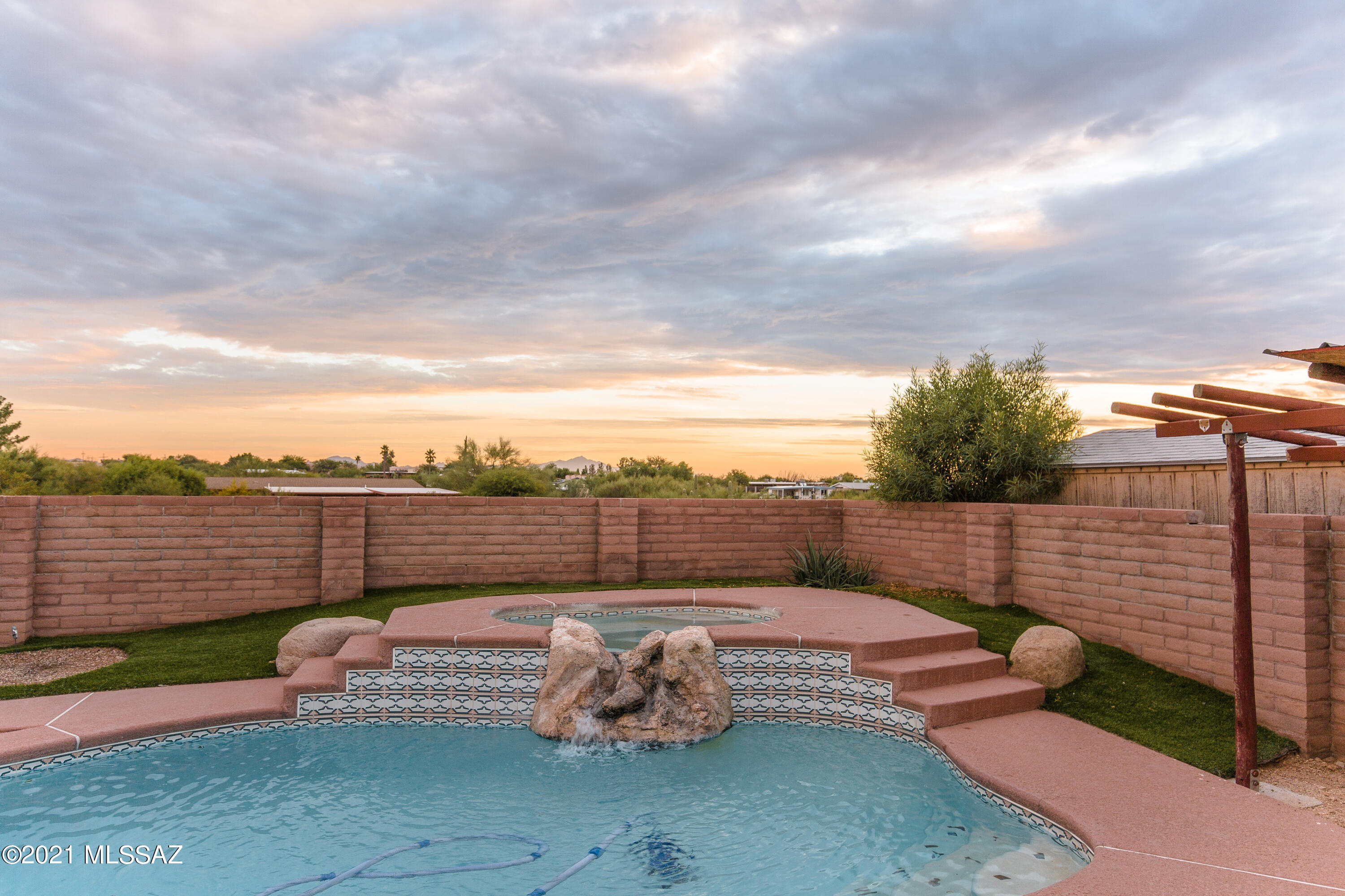 BACK-UP OFFERS ACCEPTED!
This desert oasis on almost an acre lot is a rare find! 
Complete interior rebuild in 2015 with new plumbing, electrical, HVAC, roof, windows, flooring, appliances, recessed lighting, ceiling fans and more.  Freshly painted interior and exterior. New pool pump and filter in 2021.  Includes radio/intercom system and pre-wired for alarm, cable, internet. Enjoy mountain views from this spacious, private lot and relax in the amazing pool and spa area.  Perfect for entertaining and star gazing.  Make this beautiful property your home.