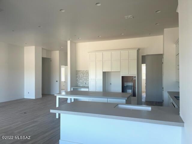 Stunning New Construction on almost an acre of land in a private gated community!! This 5 Bdrm, 4.5 bath plus an office, theater and a teen room offers plenty of space! Beautiful white, bright open floor plan with a stunning kitchen featuring Quartz countertops, stainless appliances and a large island perfect for entertaining. This home has so much to offer along with a great location. A Must See!! Listing Agent is related to Seller.