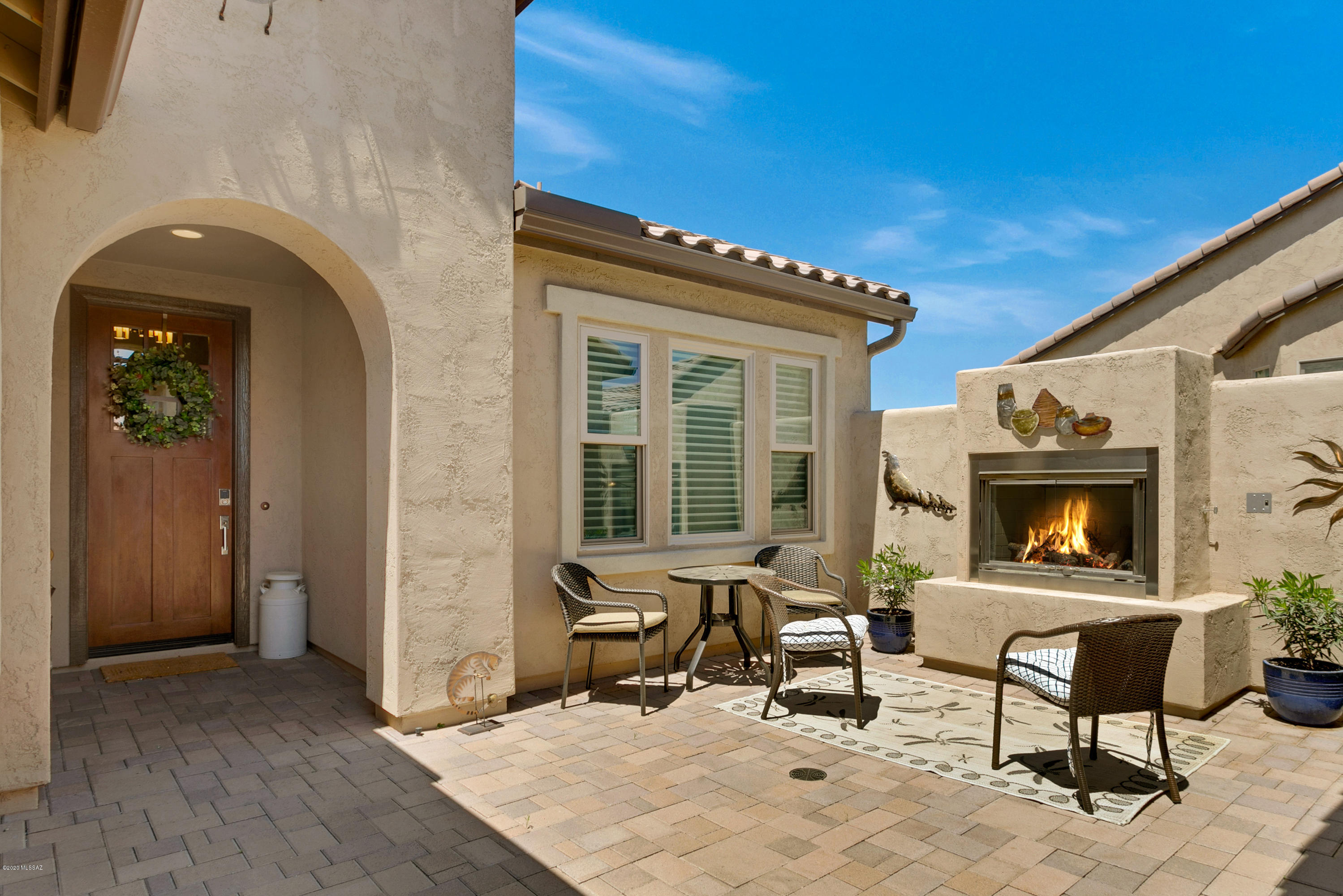 This is one of the most beautiful homes in SaddleBrooke Ranch. Situated in a quiet cul-de-sac on a large lot, this home has lots of room, storage, privacy, custom touches and a detached casita for your guests, studio or hobby room. Picture yourself enjoying conversation around your courtyard fireplace or watching the sunset from your covered patio. Paver driveway, custom gate welcomes you to the private courtyard with fireplace. This home features wood & tile floors, custom built-in and fireplace in Great Room. Chef's kitchen with pot filler and lots of cabinets. 3 bay garage, epoxy floor, storage cabinetry – lots of room for your toys! This Covina is a show piece! Backyard has a large covered patio with built in BBQ, raised herb bed and nicely landscaped. Owned Solar system!!