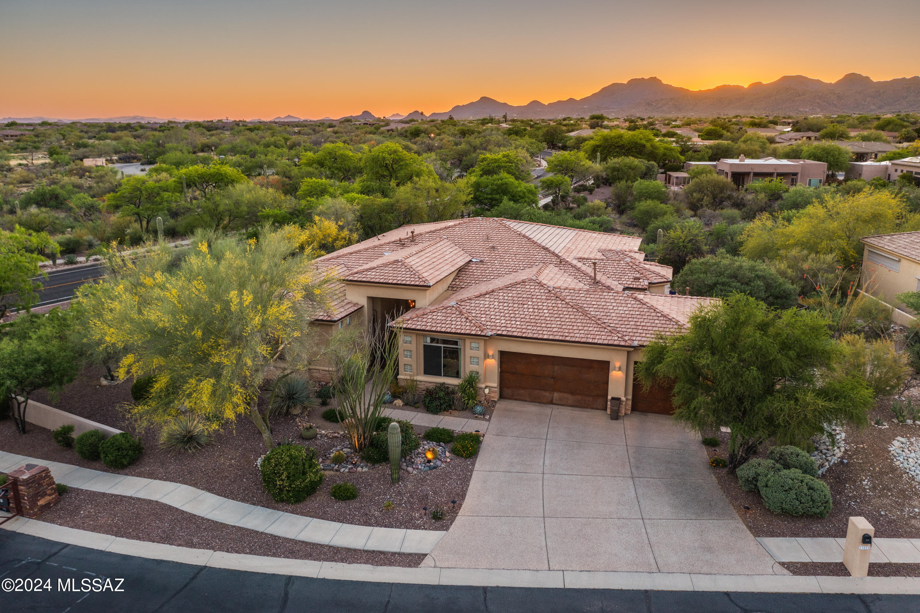 Located near Vistoso Nature Preserve and Catalina State Park this Oro Valley showpiece keynotes privacy & mountain vistas. The foyer highlights a custom, coffered ceiling, detail in finishes, flooring & expansive windows which bring the outside in. Welcome home to this 3 bedroom (2 primary suites) 3 bathroom with office/den, 3427 sq ft of style & comfort. With exterior door, 3rd bedroom or art/craft studio includes the armoire closet. Entertain with ease in the huge great room with wet bar. Oversized kitchen, built in refrigerator, gas cook top, double ovens, granite countertop, subway tile, RO water filtration. 3 car garage has epoxy coated floor, gas stub outdoor BBQ, putting green & relaxing spa. New roof 2024. Range Priced, Seller will accept or counter offers $1,000,000 to 1,100,000. Furniture, accessories and art items may be purchased on a separate  Bill of Sale, list to be provided upon request.