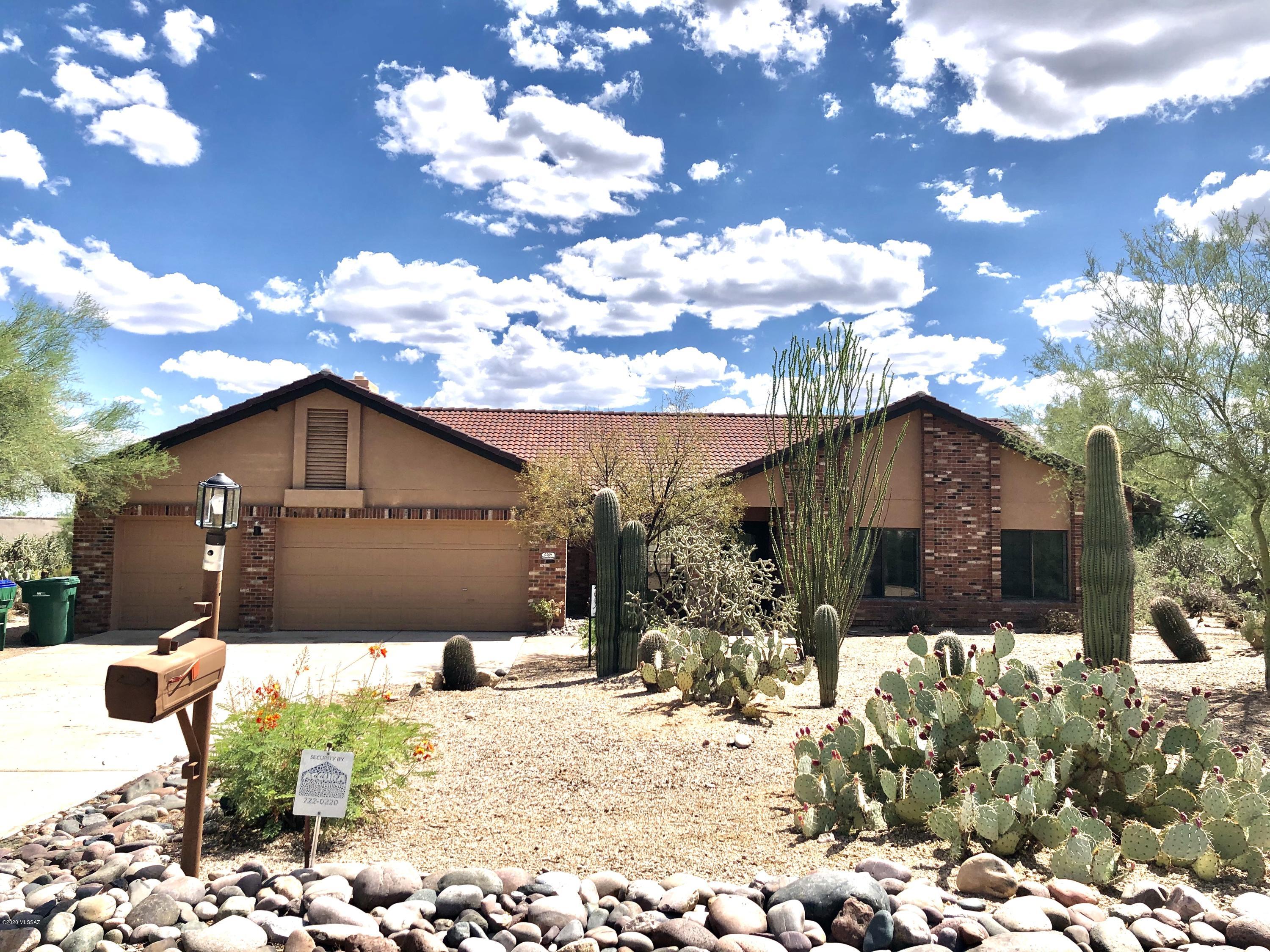 This Solid totally recently remodeled 4BR/3BA masonry home in school district 16. Single story with 3 car garage. On Quiet/Serene Cul-de-sac. Premium one acre Lot With Majestic Catalina Mountain Views, Surrounded By Lush Desert.  Architect Bob Taylor deigned stuning open airy home with high ceiling. Bright/Open Floor Plan.  Rock Fire place, Vaulted Ceilings, Dual Pane Windows, Ceiling Fans.  Brand New kitchen cabinet and granite countertop.  New appliances, New tiles floor throughout.  New carpets in all bedrooms.  Spacious newly renovated master bathroom.  The Charming back patio with concrete pavers and flag stone.  Installed New heating/cooling units in 2020 .  Brand new irrigation system.  Replaced patio roof in 2019.  No HOA. Close to La Encantada Mall. Near by shopping, Dinning, and School.