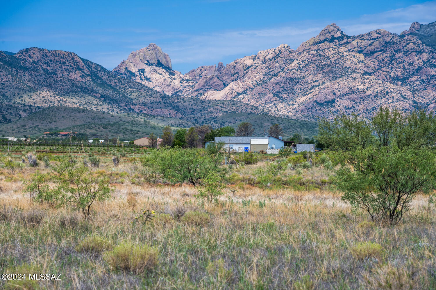 New Price Drop! Discover the perfect canvas for your dream home on this ready-to-build 4-acre lot in Sunsites, offering breathtaking views of Cochise Stronghold and the Dragoon Mountains. Just steps from a charming local vineyard, this property boasts underground power, as well as a shared well with a water line, and a meter already installed. The coveted RU-4 zoning allows for the Cochise County Opt-out, providing exceptional flexibility for your build. This rare opportunity includes the option to purchase four adjoining lots on the well-share. The seller is open to combining parcels, enhancing the potential for your vision. Embrace the serene beauty and convenience of this exceptional lot, poised for your custom retreat.