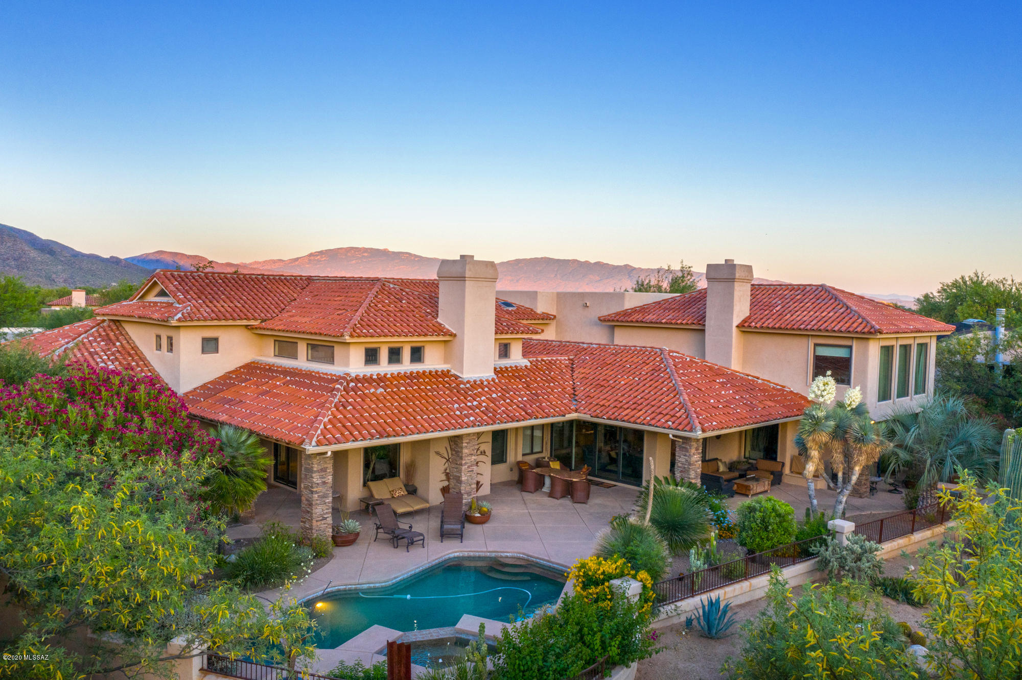 You MUST SEE THIS jaw dropping estate on Prestigious Ventana Canyon Golf Course. Featuring 2 Master Suites, one on each level, a gourmet kitchen w/walk in pantry, massive windows, gorgeous Master bath and unbeatable backyard. Notice the Copper detail from the garage doors to the charming main entryway. Each bedroom has its own private bathroom. The wine cellar holds over 600 bottles of wine. There is over 2000 sf of furnished outdoor living space, all the outdoor furnishings will stay. From the gym to the luxurious backyard overlooking the 9th hole, you'll be amazed at all the stunning details throughout this home. Looking for perfect place with a mix of fun and relaxation?? Look No Further