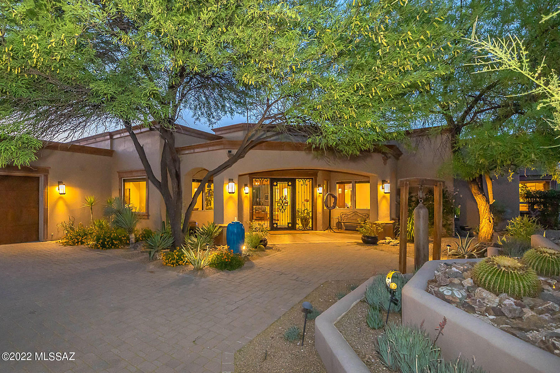 Spectacular custom 4BD/4BA (4,585 sq ft) estate on premium 3.3 acre cul-de-sac lot in gated Catalina Foothills Estates. Boasting resort-style living with panoramic mountain & sunset views, this impeccable home is complemented by formal & informal living spaces showcasing wood beam ceilings, skylights and picture windows. Expansive Great room w/FP offers a professional kitchen w/center island, high-end appliances and gorgeous slab granite. Elegant Owner's suite hosts FP, dual closets & luxury bath w/dual vanities, soaking tub & walk-in shower. Two en suite guest rooms, exercise/4th bedroom, office, plus pool bath. Retreat to the expansive rear yard w/extended patios, spa, heated pool w/rock waterfall, firepit, outdoor kitchen and awe-inspiring views. Perfect for the most discerning buyer!