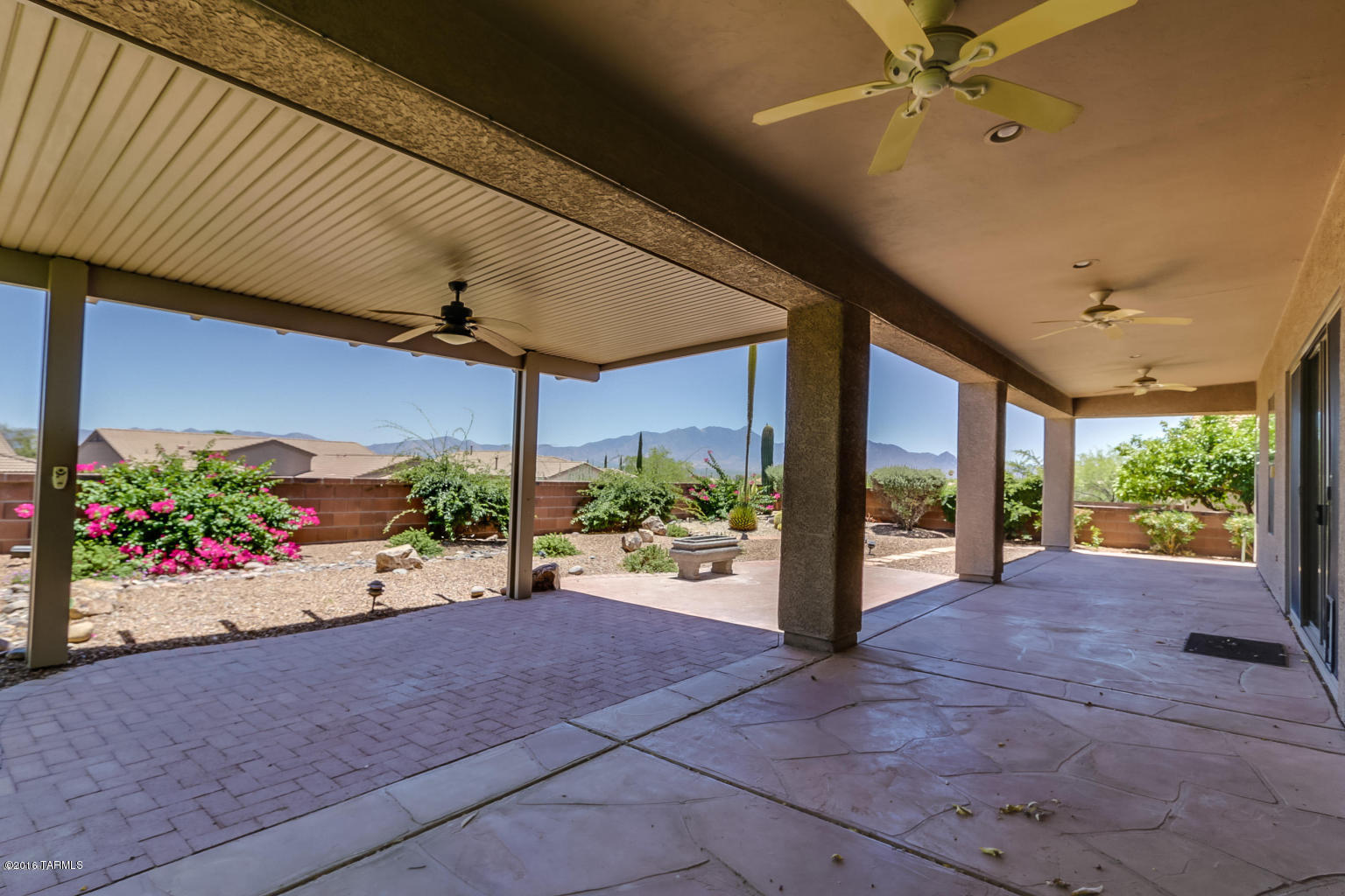 GREAT VIEWS and so much more! This Cayetano floor plan has it all. Too many upgrades to list. Gated entry leads into this open and airy split bedroom floor plan. Great room, flows to Dining Room with built-in buffet with tons of storage. Amazing kitchen features Corian Countertops, under cabinet lighting, and a breakfast bar island. Double doors to the Den/Home Office. Spacious Master Suite leads to the highly appointed Master Bath with separate garden tub and shower. Super-sized walk-in closet! Elevated lot provides phenomenal views from the private backyard. Beautifully landscaped with extra covered patios, misting system, fruit trees and fans. Oversized garage with screen garage door, epoxy floor and storage cabinets. Alarm system, built-in speakers, ceiling fans & fresh interior paint.