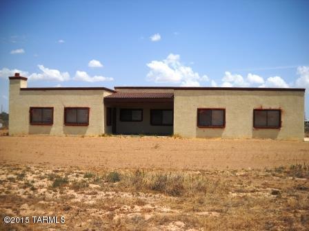 So.Western home built in 2001 and never been  lived in, some very needs minor repairs. good solid Construction  with 8 inch block, stucco all electric home private well,50 gpm-6,000 gal storage tank 48X56 work shop with 3/4 bath This property is a super steal, the road to the property is a little difficult, however that will change. nice neighbors that are nearby. Great Property, show and sell