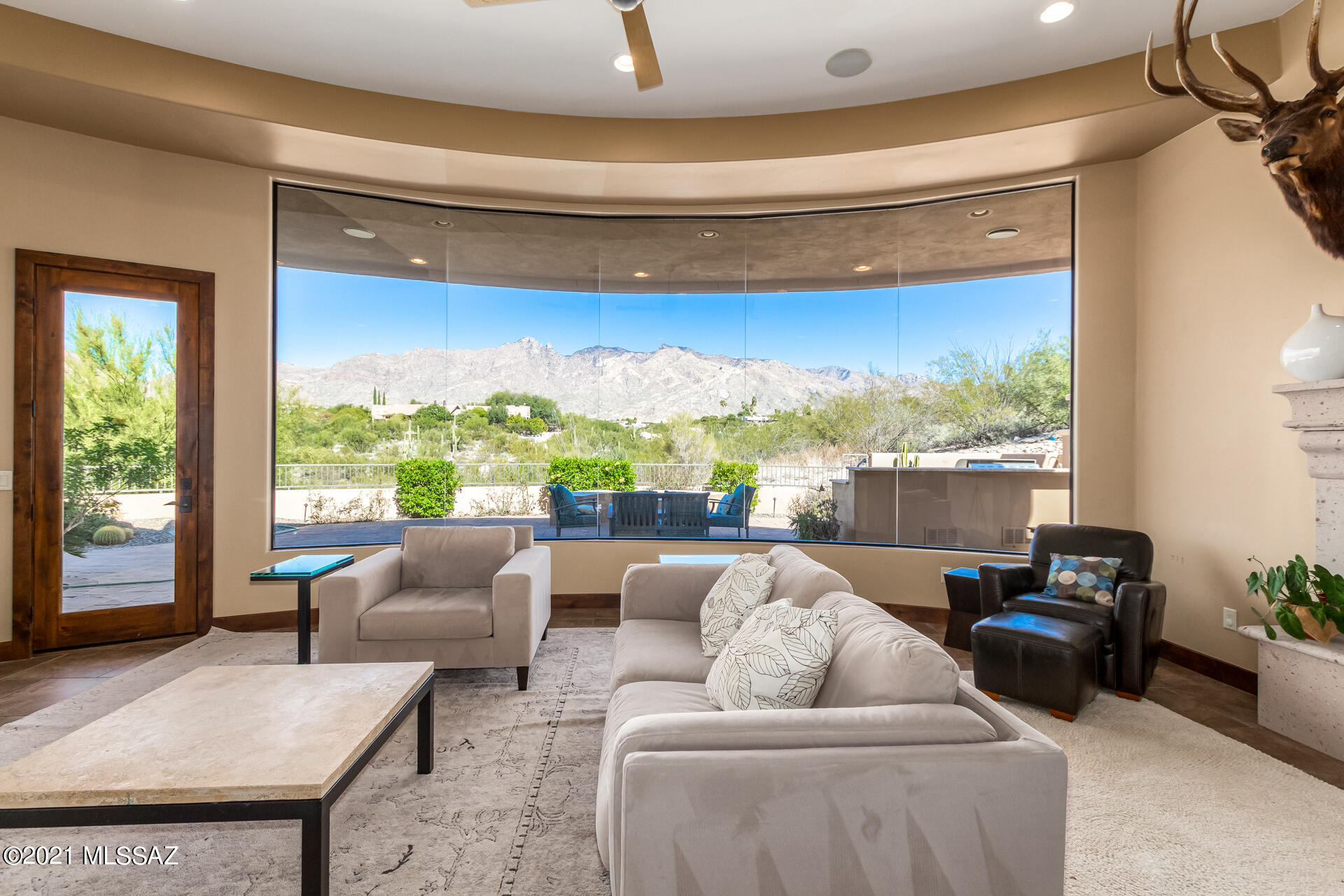 Breathtaking contemporary style home located in the heart of the Catalina Foothills! Three bedroom two and a half bathroom with over 2,700 Sq Ft. Split bedroom floor plan with tons of natural light. Great unobstructed Catalina mountain views all around. Plenty of cabinet and counter space located in the eat-in kitchen with beautiful granite counters, large island, breakfast bar, garbage disposal and stainless steel appliances. Tile throughout home. In the master bedroom you will find a walk-in shower, soaking tub, double vanity and spacious walk-in closet. The luxurious backyard is perfect for entertaining...equipped with a firepit, built-in BBQ , amazing mountain views, covered shaded patio and so much more. Schedule your showing of this dream home today!