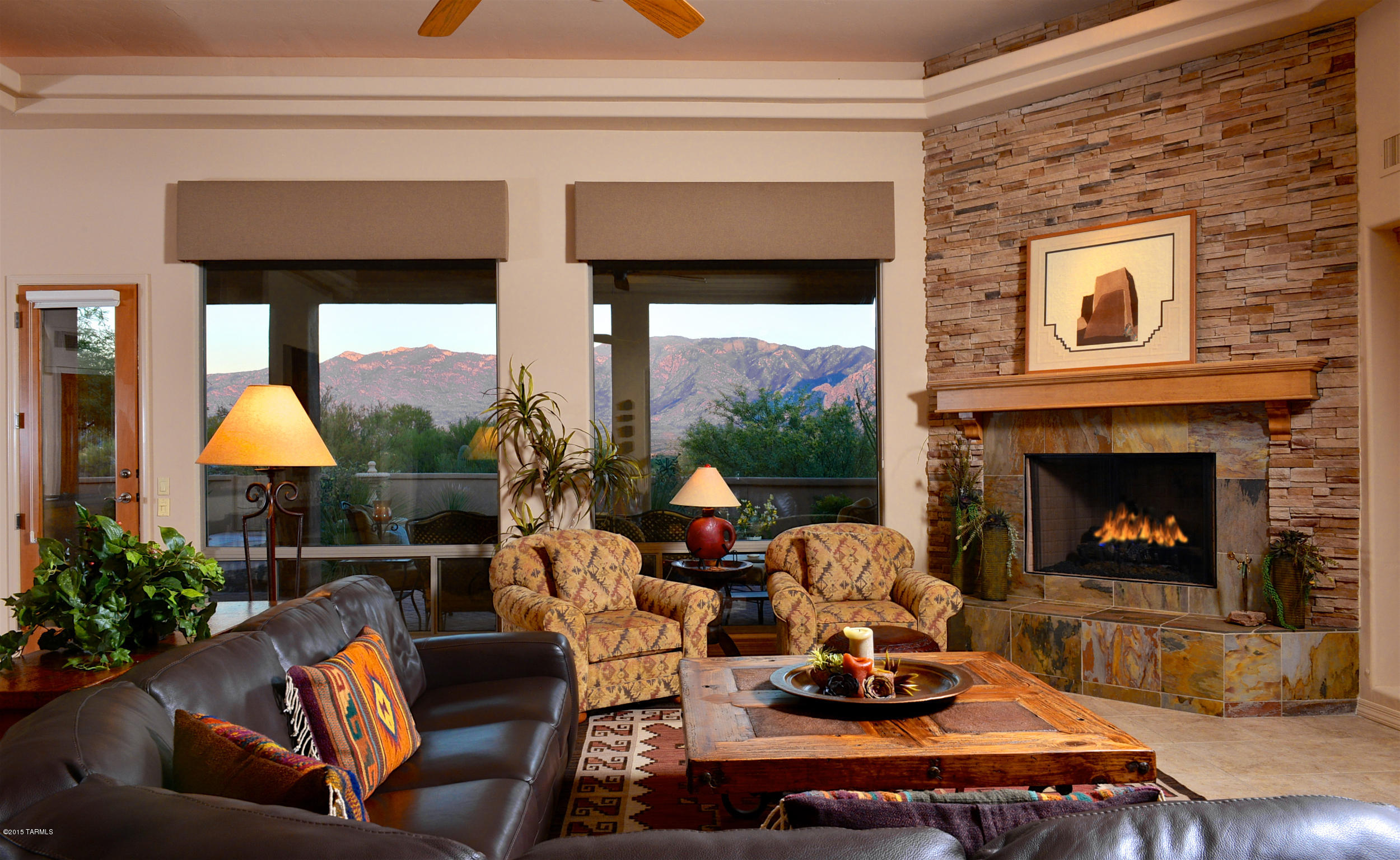 Panoramic Catalina views from high elevation over open desert! Serene, private location off cul-de-sac with spacious east-facing patio (room for pool/spa). Comfortable great room layout with formal dining, luxurious master, Den with built-ins (or BD#4) & 2 guest rooms (or Next Gen Suite) with ideal guest bath. Amazing views from all rooms! Chef's kitchen: slab granite, upscale appls (Dacor, Asko), pantry, gas cooktop, 2 ovens, desk area, nook and bar counter. Tile flooring throughout main living areas, coffered ceilings & lots of windows. Covered L-shaped patio accessed from kitchen, great room, master and guest suite. Large 3-Car Garage with A/C. Mature landscaping, open design & tranquil location in gated High Mesa! Most furnishings avail. Oro Valley Home Tour Winner!
