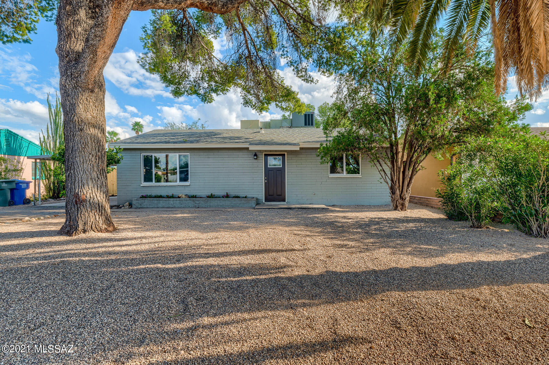 Wonderful Opportunity to Own Two Homes in Central Tucson for the Price of One! 2Bed/1Ba Main Home w/ 1Bd/1Ba Guesthouse. The Main Home Features a Welcoming Living Room & Cozy Family Room w/ Wood Burning Fireplace & Large Laundry Room. The Welcoming Kitchen has All New Cabinetry, Black Appliances w/ Gas Grill & Granite Countertops. Two Spacious Bedrooms & Beautifully Remodeled Bathroom w/ Custom Tiled Shower & New Vanity. The Guesthouse Has an Open Floorplan w/ Dining/Living Space & Lovely Kitchen w/ New Cabinetry, Black Appliances & Granite Countertops. Large Primary Suite & Remodeled Bathroom w/ Custom Tiled Shower & New Vanity. New Wood Look Flooring, Fresh Interior/Exterior Paint & Fresh Landscaping. Conveniently Located Near Shopping, Dining & Entertainment. Go Show Today!