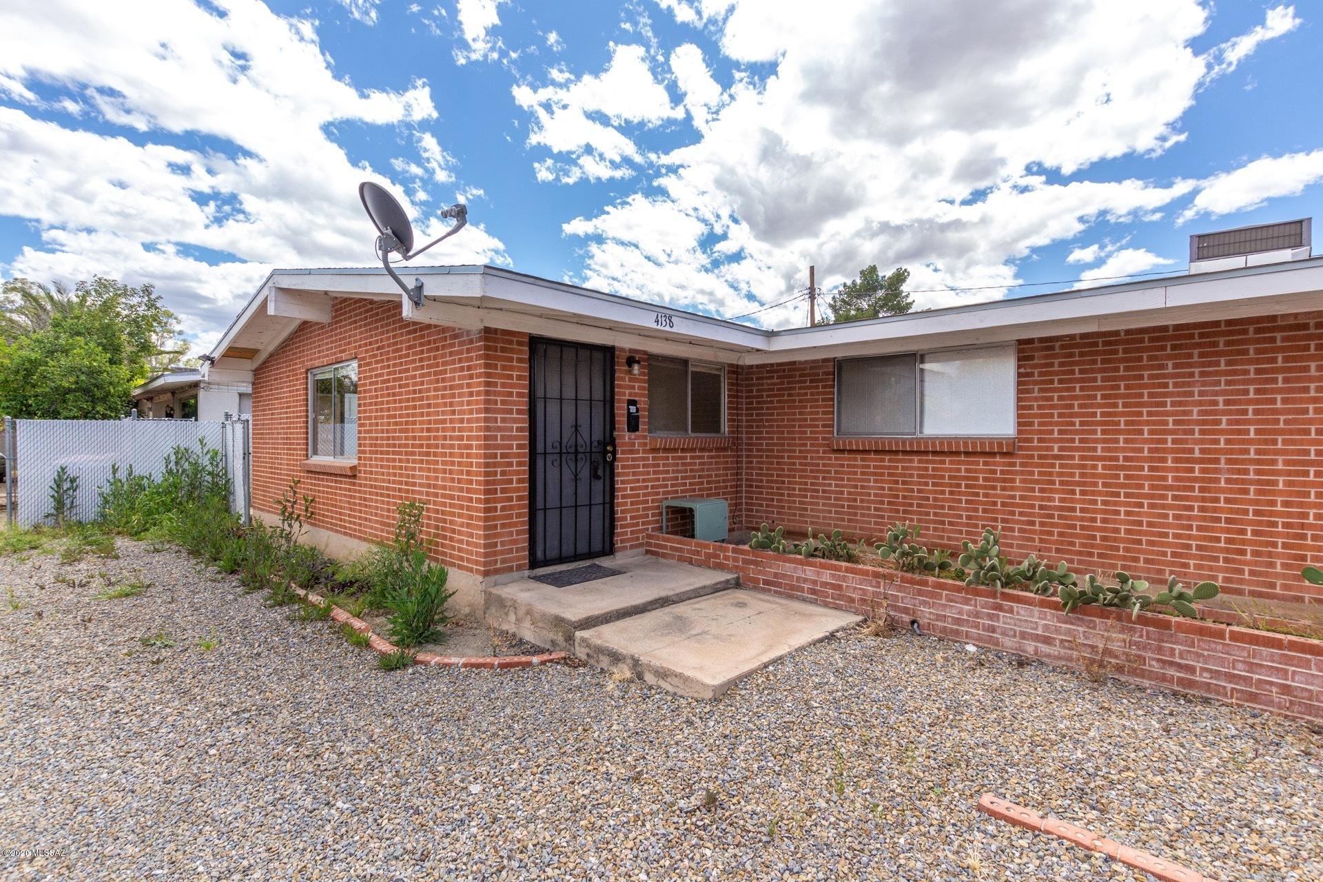 Exceptional red brick duplex with plenty of space and lots of room for parking as well. Centrally located with shopping, entertainment, and dining close by. Specious living room with dining and kitchen creating an open floor plan. Lots of storage to include a two unit building in the spacious backyard, which is divided for privacy. Must see today!