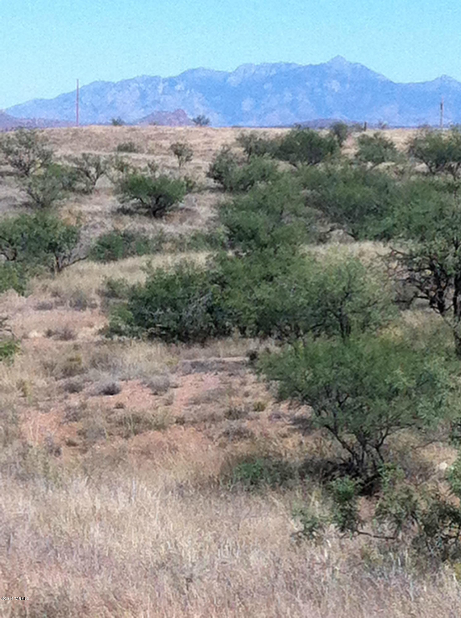 Living Rural at it's finest. Gently rolling with spectacular views all around. 5+ Ac parcel ready for you to set up your own ranch. Will need well or well share and septic.