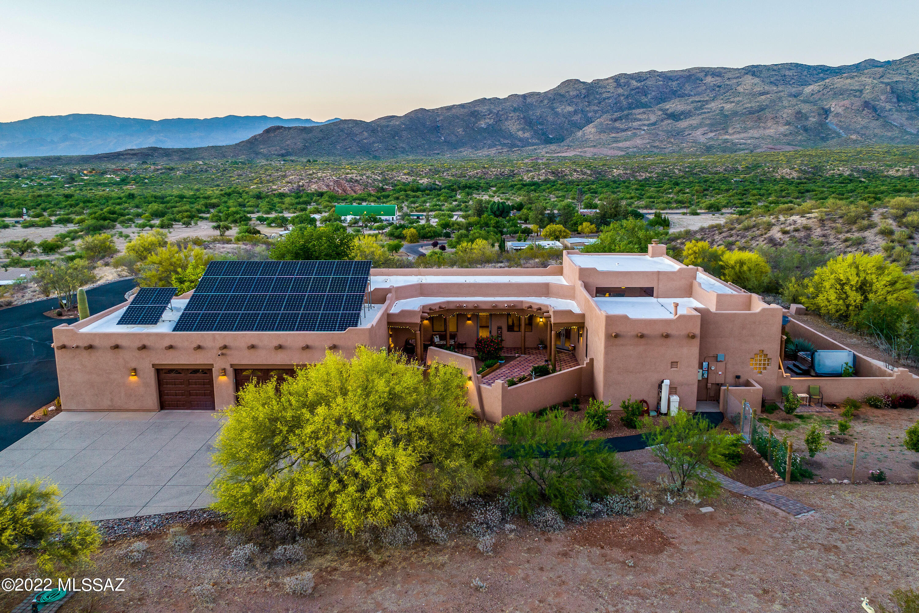 Welcome to your ''Resort Style'' home! Minutes from Rincon Mountain Range & Saguaro National Park, your year round recreation awaits, yet within minutes of shopping and restaurants. Sitting on a 5 acre hilltop with 360* views of mountain ranges, the moon rises, sunrises and sunsets never disappoint! Enjoy dark skies for star gazing from your spa. Citrus, fruit trees, rose and cactus gardens with an unending list of flowers, herbs and palms will take your breath away. Enjoy the heated pool with the beautiful north facing covered patio and spa in the winter. Two primary bedrooms & all 4 bedrooms have walk-in closets. The solar, 20 yr warranty, allows you to stay cool w. an electric bill that is ZERO most months. Abundant wildlife is yours to enjoy. The owners have taken meticulous care .