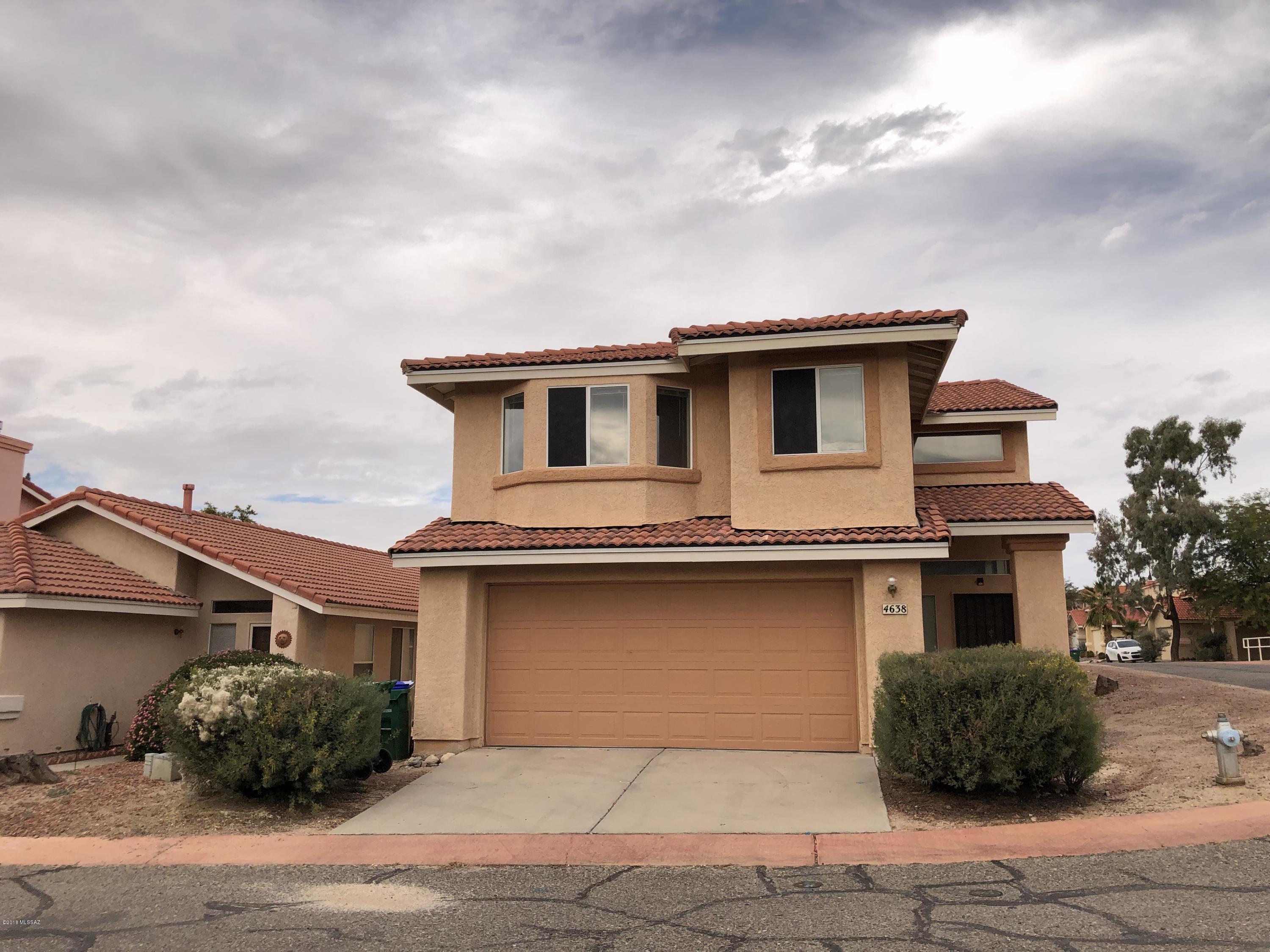Owner will accept offers between $195K and $210K. GREAT INVESTMENT OPPORTUNITY! Entire interior has been freshly painted.  5 BEDROOMS in NW Tucson!  DONT MISS OUT ON THIS ONE! Walk into this light and bright living area plus dining space.  One Bedroom and Bathroom downstairs.   Kitchen is open to Family Room.  Huge master bedroom with seating bench at Bay window, Master bathroom features separate shower and Garden Tub.  3 more bedrooms upstairs plus a full bathroom.  Lots of storage space especially with storage closet that goes back several feet.  Back patio  is extended and goes full length of house.  This home is being sold AS-IS with no warranties expressed or implied.  There is enough tile on patio to tile the downstairs bath and bedroom.