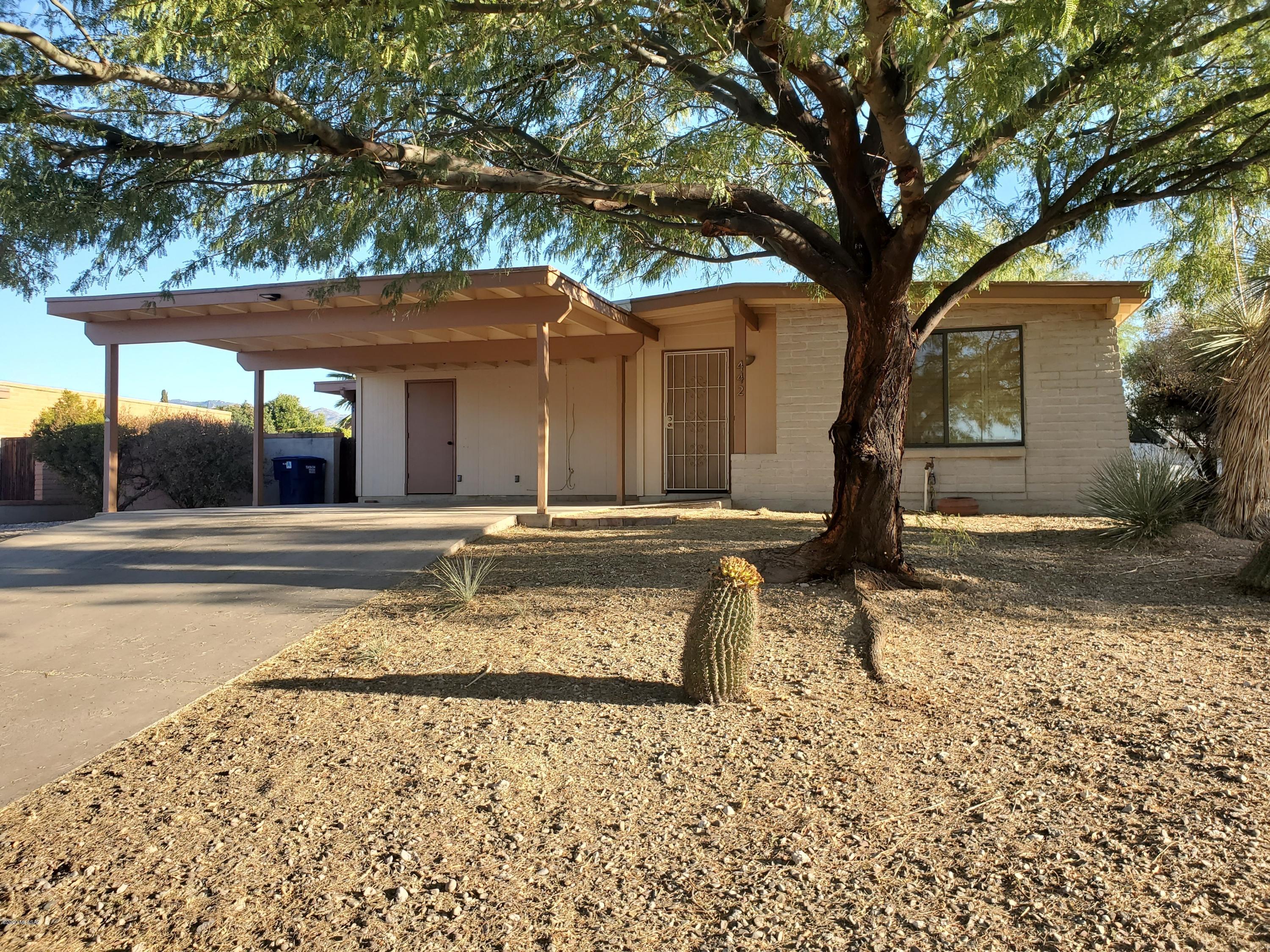 This spacious 3 bedroom, 2 bathroom-Eastside home with pool - has been perfectly remodeled. Tile floors throughout, upgraded lighting, custom paint, formal living/dining areas. Large eat-in kitchen with center island, all appliances. Master bedroom suite, 2 larger bedrooms, neutral palette.. Backyard oasis with convention pool with pool service, covered patio - perfect for entertaining. 2 car carport with storage room, A/C, NO HOA. Close to DMAFB, Hospitals, shopping and bus lines.