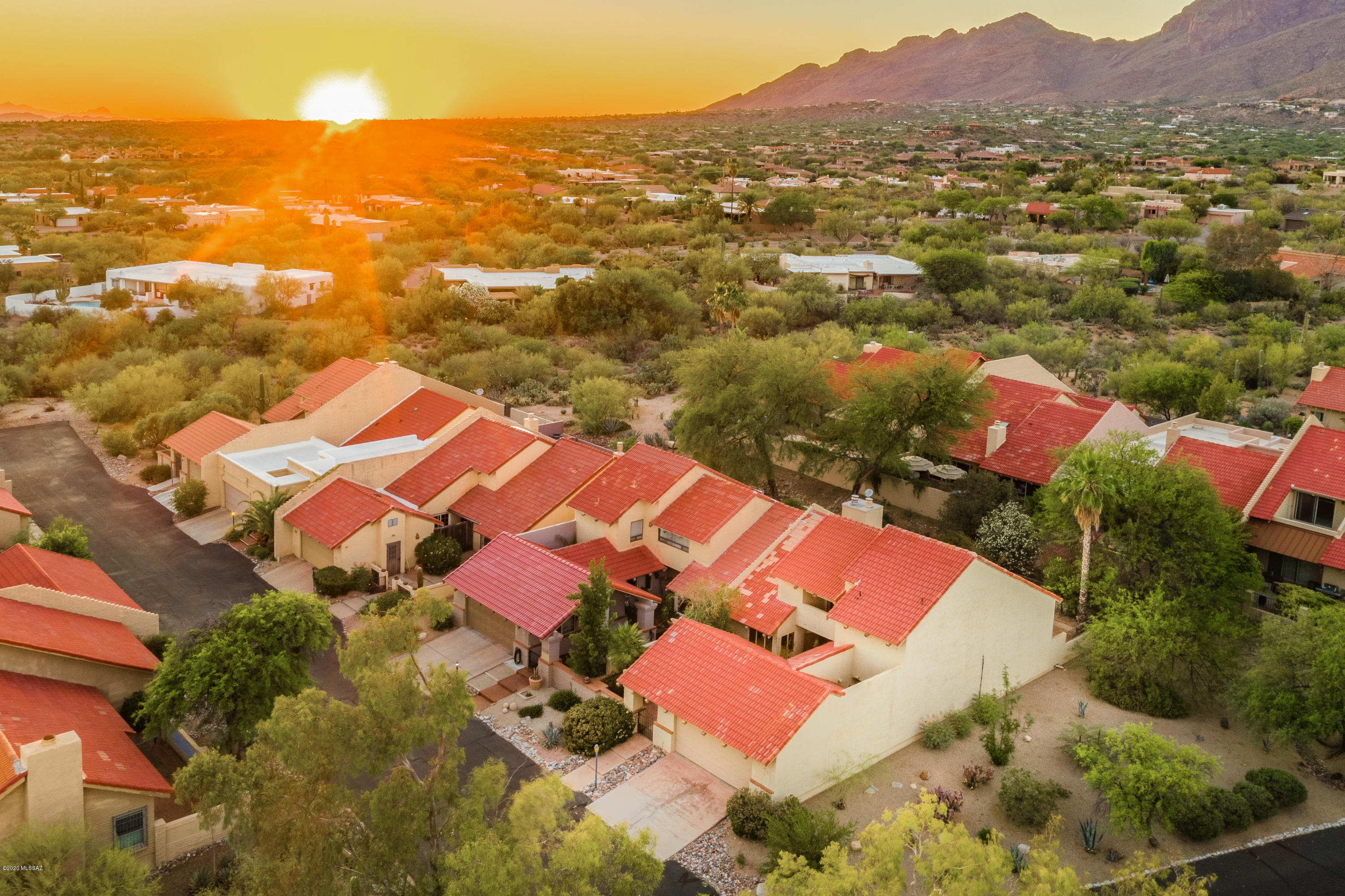 Spacious townhome nestled in a premium end lot at the stunning Catalina Foothills area! Comforting open concept floor plan with breathtaking vaulted ceilings. Updated kitchen cabinets, counters and cooking appliances. Spacious bedrooms with equally ample closet spaces. Recently renovated master shower. Energy savings in mind with a recently upgraded AC unit, dual pane windows and sliding doors. Entertain in style with the living room wet bar and exquisite outdoor retreat. Premium shopping, grocery markets and culinary delights are all minutes away! This home features convenient cabinet and closet spaces. With all that this home has to offer, come in for a tour and finish it with the serene view of either of 2 balconies to help you dream of your new life on Placita del Baron!