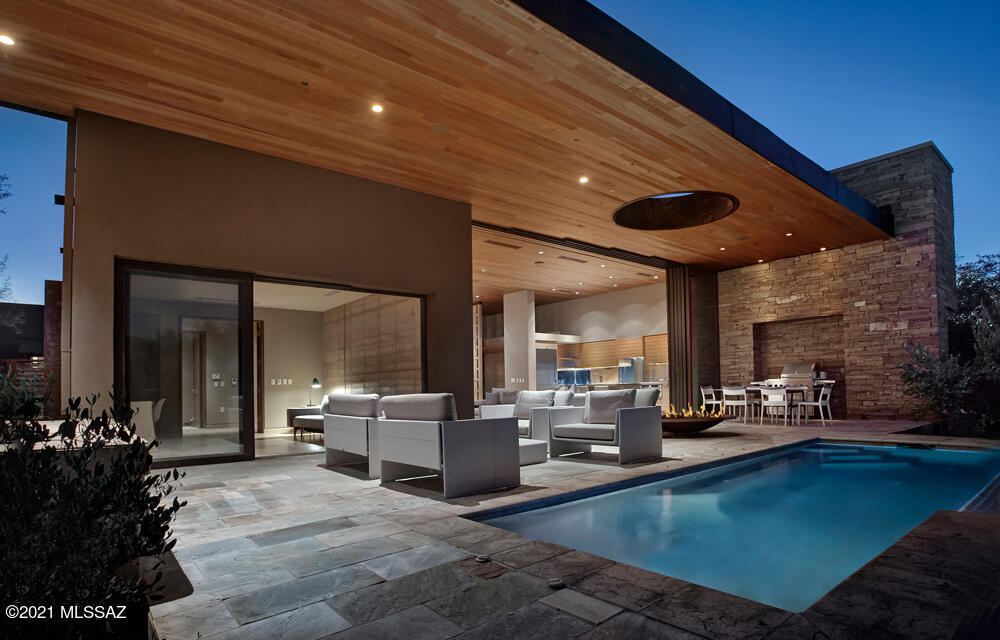 The Villas at MIRAVAL RESORT offer what no other residence can -- one of the world's most acclaimed wellness destinations, at your doorstep.  Life in balance begins here.  

This inspired residence is true retreat. The seamless blend between indoors and outdoors, complemented by unobstructed views of the Santa Catalina Mountains invite you to relax, breathe and connect with nature. Facing east, morning sun illuminates the patio. As light moves throughout the day, the desert unveils different layers of beauty. Colors and materials mimicking those found in the Sonoran Desert have been integrated into the design of this exquisite property. Rammed earth, reclaimed wood, stacked stone, concrete, and quartzite layer texture throughout the space. Each choice made by the architectural team at MITHUN and the award winning design group CLODAGH was done to create both a beautiful and sustainable home. Awarded the Silver LEED certification by the Green Building Council, this property is offered fully furnished.  

With on-site property management, this residence makes an excellent vacation home.  A resort managed rental program is available.