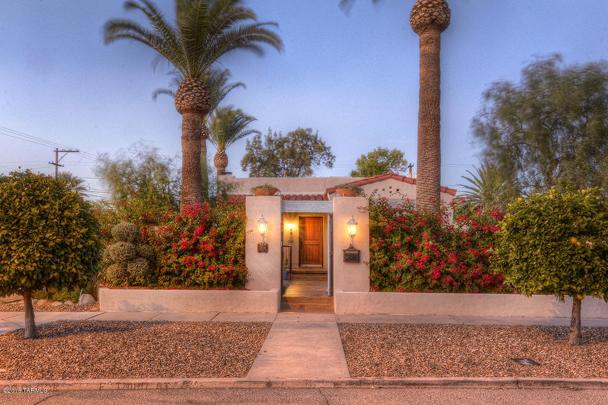 A MARVELOUSLY AND TOTALLY RESTORED CLASSIC TUCSON 1933 SAM HUGHES HOME INCLUDES A SEPARATE 396 SQ FT GUEST HOUSE W/A PRIVATE ENTRANCE! THIS SAM HUGHES EQUISITE PROPERTY HAS 2269 SQ FT, 4 BEDROOMS 3 BATHROOMS IN THE MAIN HOUSE AND HAS RETAINED MUCH OF THE ORIGINAL CHARM AND STYLING OF A HOME OF THIS ERA WHILE BLENDING GORGEOUS NEW CUSTOM FINISHES INCLUDING; WARM WOOD FLOORS, ORIGINAL FP, STONE/ MARBLE BATHS/UPGRADED FIXTURES, COVED CEILINGS, AN EXCITING NEWER KITCHEN W/CHERRY CAB'S-GRANITE COUNTER TOPS & SS APPL'S, COURTYARDS, PATIOS & LAUNDRY ROOM PLUS A 354 SQ FT, 2 CAR GARAGE! RIGHT ON COVETED 3RD STREET AND BACKS UP TO HIMMEL PARK!