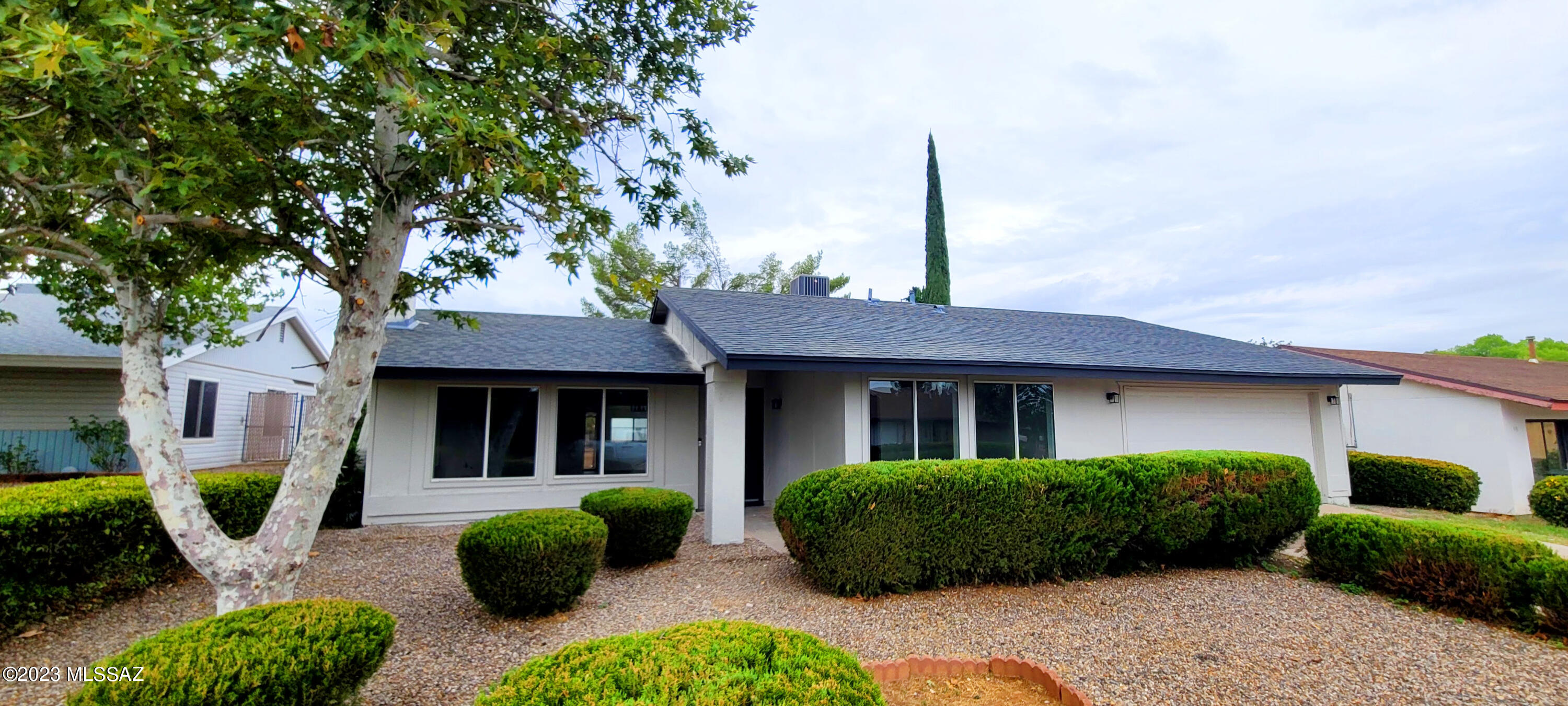 Single family home featuring 4 bedrooms 2 bathrooms and a 2 car garage.