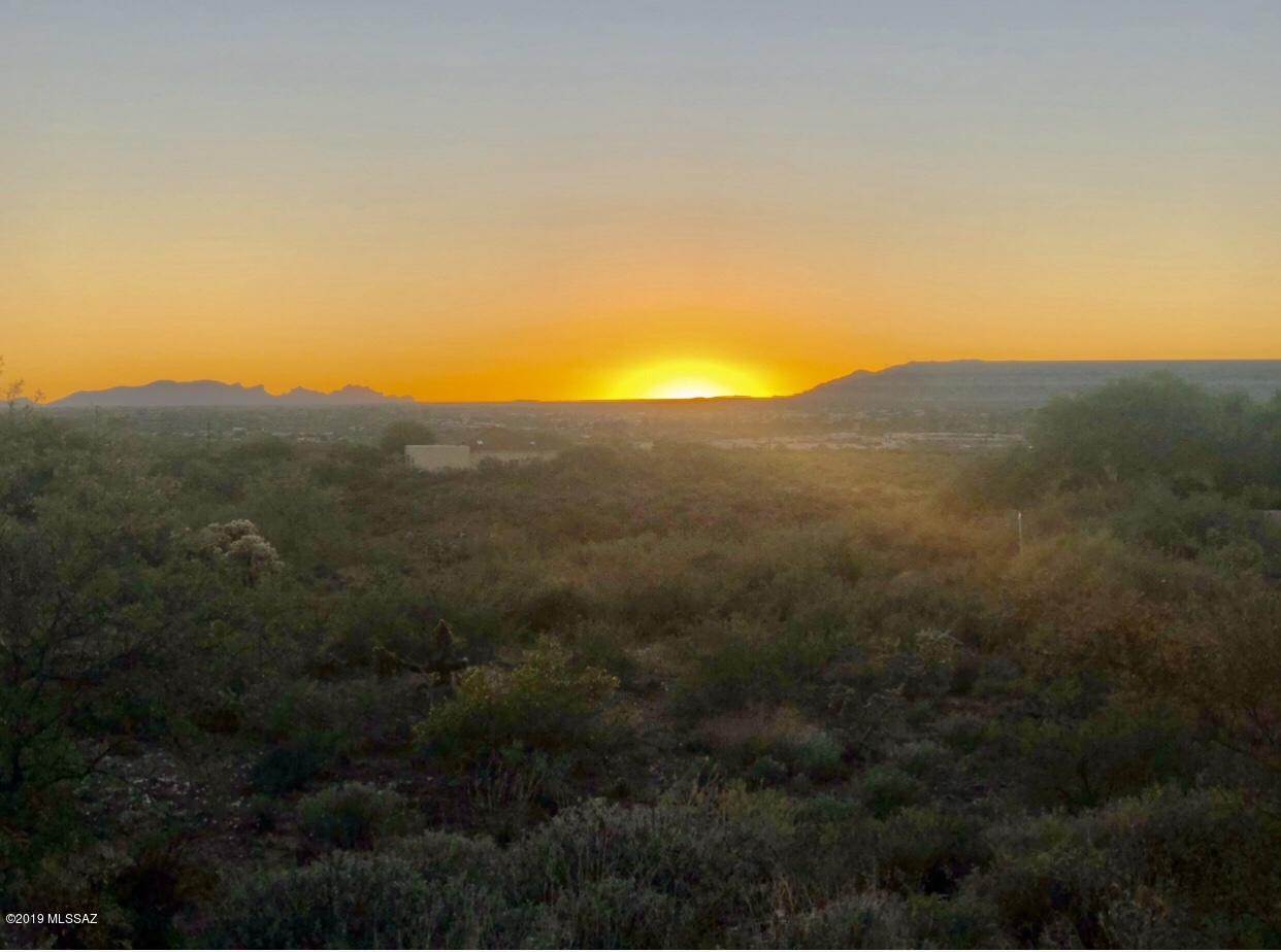 Excellent location to build your dream home! Located in private and prestige Madera Foothills, with amazing views of the Green Valley area and incredibe sunsets. Very close to Madera Canyon and easy access to I19. 2.03 acres of natural desert and just beautiful surroundings.