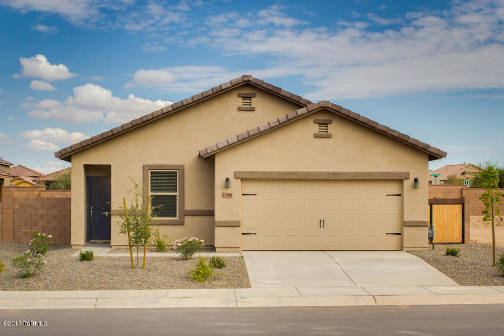 The Taos floor plan is located within the picturesque community of Sonoran Ranch. This beautiful, new one story home features an open floor plan, 3 bedrooms and 2 full bathrooms. This new home comes with over $10,000 in upgrades including energy efficient kitchen appliances, spacious countertops, custom wood cabinets, brushed nickel hardware and an attached two car garage. The Taos showcases a master suite complete with a walk-in closet, as well as a fully fenced backyard, covered entryway and front yard landscaping. Dispersed throughout the Sonoran Ranch community you will find miles of walking trails, as well as a park with a children’s playground and a spacious picnic area.