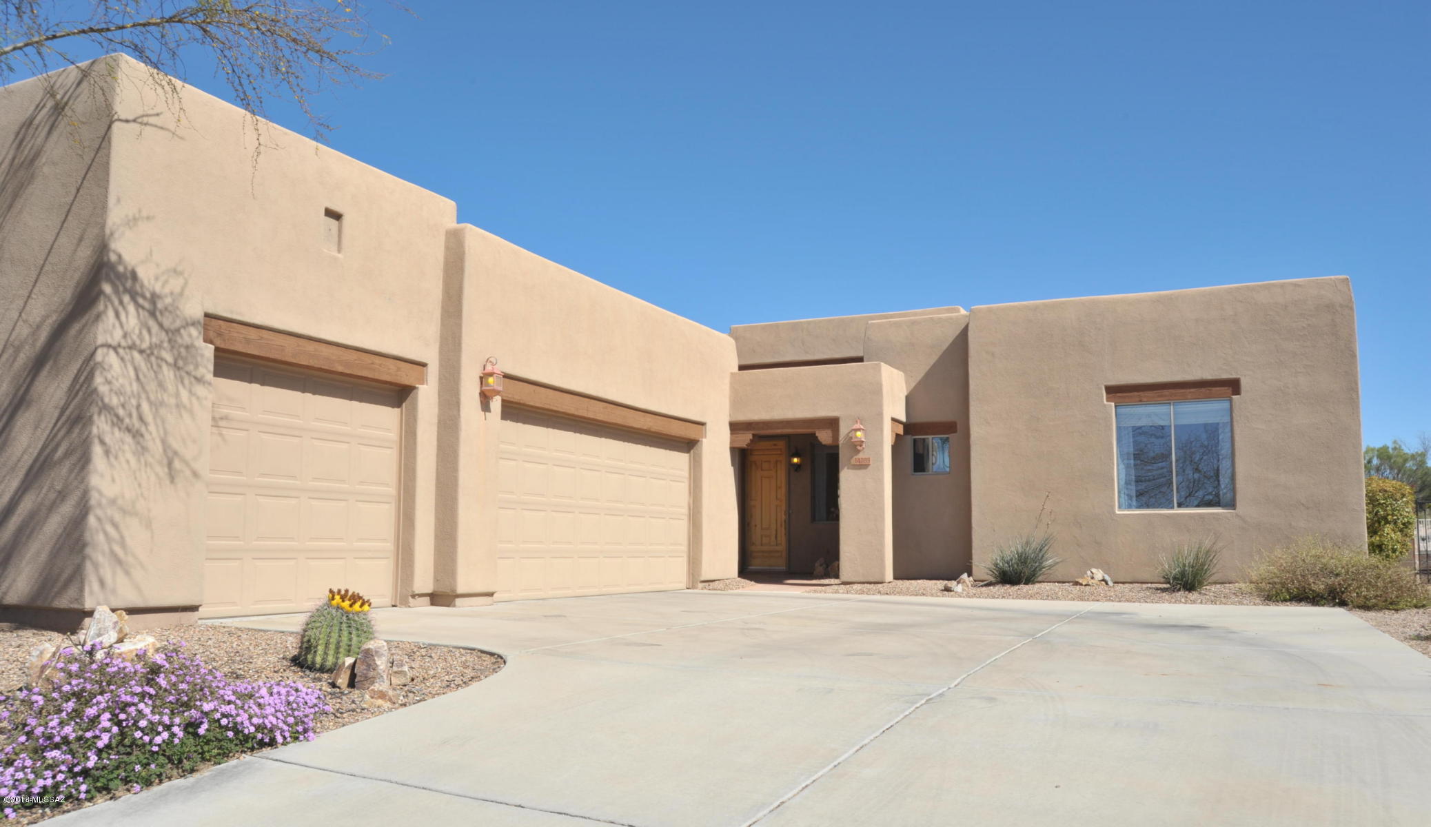 You'll feel right at home in this private, gated, luxury home nestled just off the 1st Fairway of Del Lago Golf Course... privacy without golfers passing by your back yard. You'll love all the travertine & ceramic tile throughout this beautifully maintained and newly upgraded home. You'll love the 2-headed shower in the Master Bath & your skin will love the soft water! All 3 garages have electric door openers, plus rince out suits in the utility sink in the garage. Security system is installed, if you choose to subscribe. The community pool and spa are just feet from your front door in the same cul-de-sac! Call NOW for your private showing! This beauty won't last on the market long! Owner is a licensed Broker in Arizona.