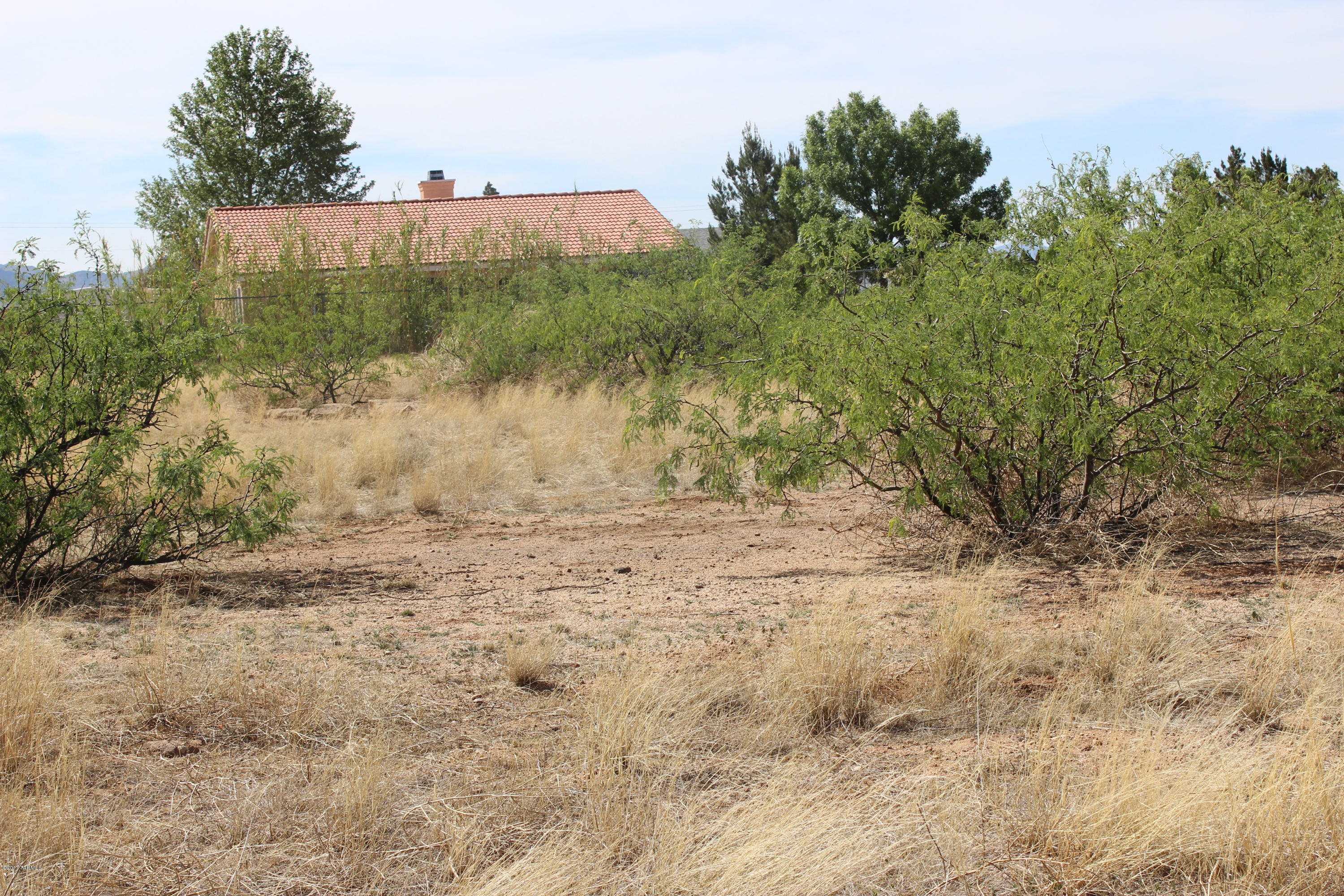 Sunsites subdivision lot with utilities to the lot line.  Zoned SR-8, one dwelling per 8,000sf.  Nice neighborhood; next to Community Church of Sunsites.  Amazing views of the Dragoon Mountains.  Three contiguous lots also for sale separately, or buy all four with discount!