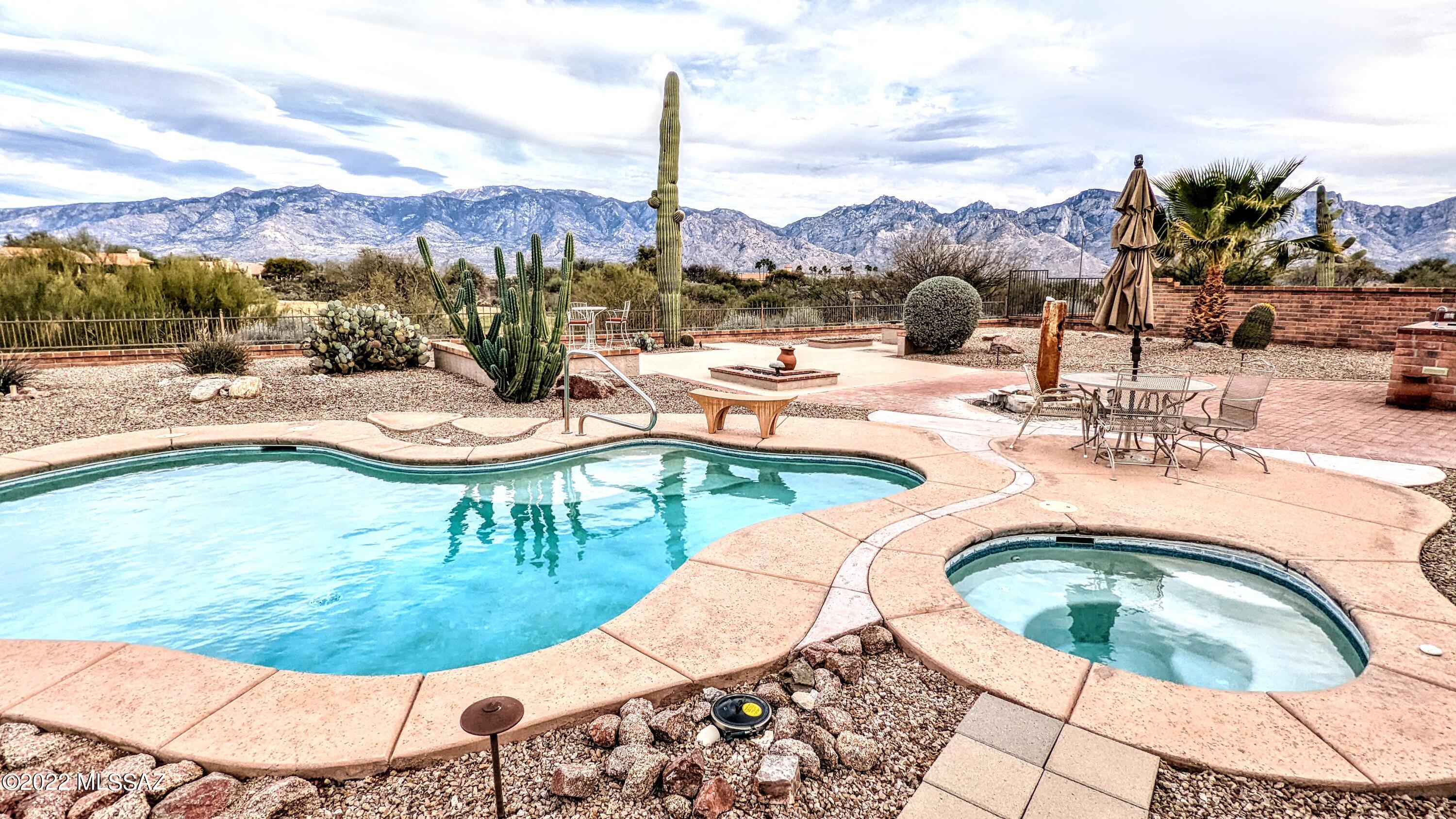 Spectacular Mountain Views from this East patio Pacifica Model home in Tucson's Sun City Vistoso.
Two bedrooms PLUS Office, Plantation Shutters, POOL AND SPA, Fireplace, Enchanced Hardscape in Rear Yard with lots of outdoor Living Areas. All appliances included. Close to Clubhouse, Golf, Tennis, Fitness- all the great amenities of this community. Pets with Owner's approval. Need a place to ''camp'' while you're shopping for your home, or building new? We do FLEXIBLE LEASES! Available June 1st.