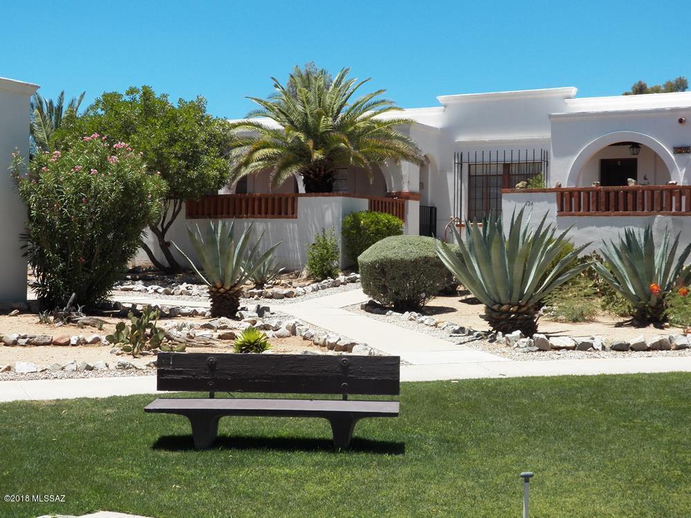 Furnished villa, set back from parking lot, sitting high and pretty facing a green park. East covered patio. Easy-care tile floors. Crisp white kitchen cabinets and newer countertops. Good storage space in the kitchen as well as the rear storage shed, not plumbed for W/D, but probably could be with HOA approval. Upgraded plantation shutters and freshly painted interior. Community pool and laundry just north of this villa on the same street. Currently not a member of GV Rec. although it is available.