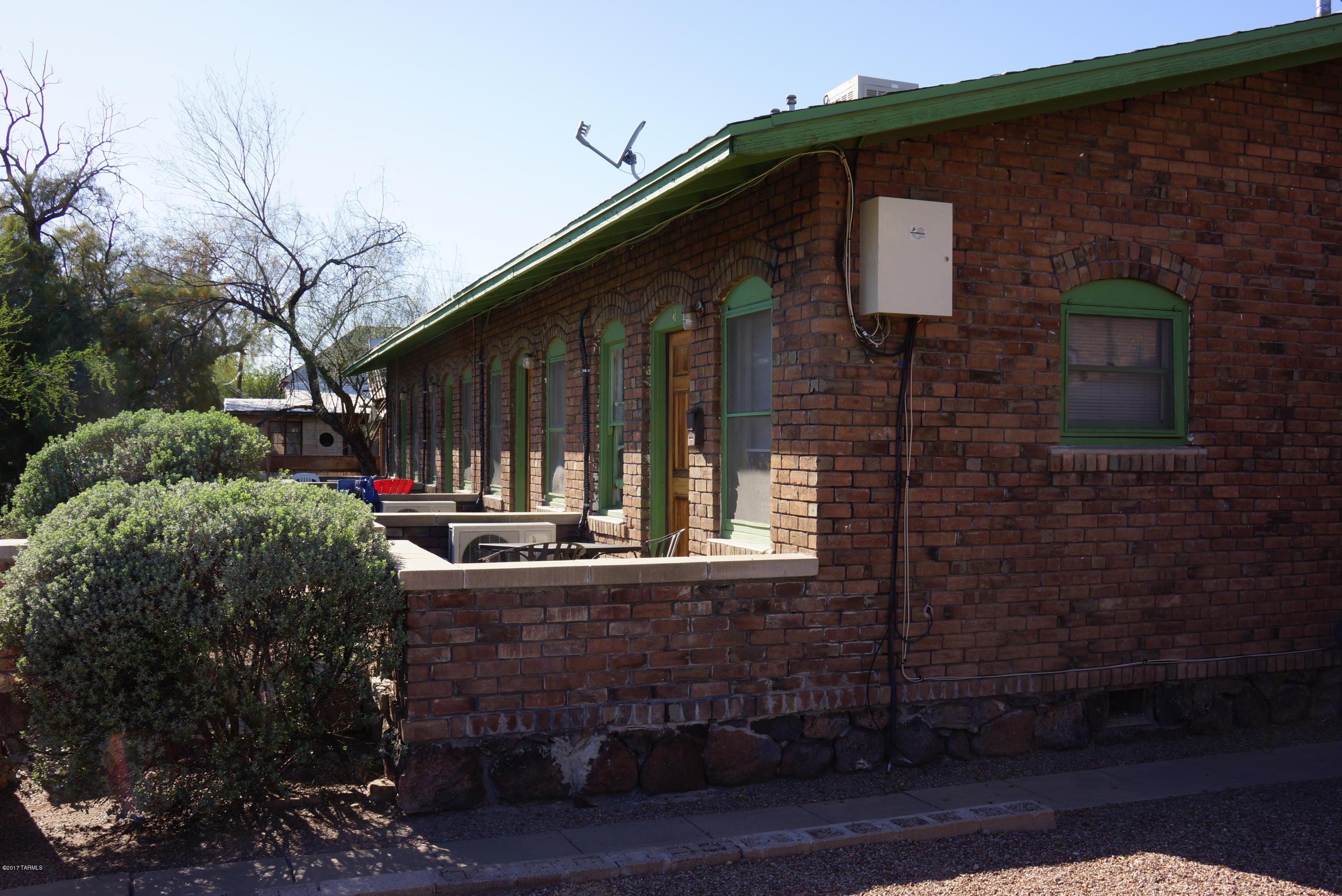 Must see to appreciate. 17 railroad housing  style units. Just 4 blocks from U of A. All units upgraded with A/C