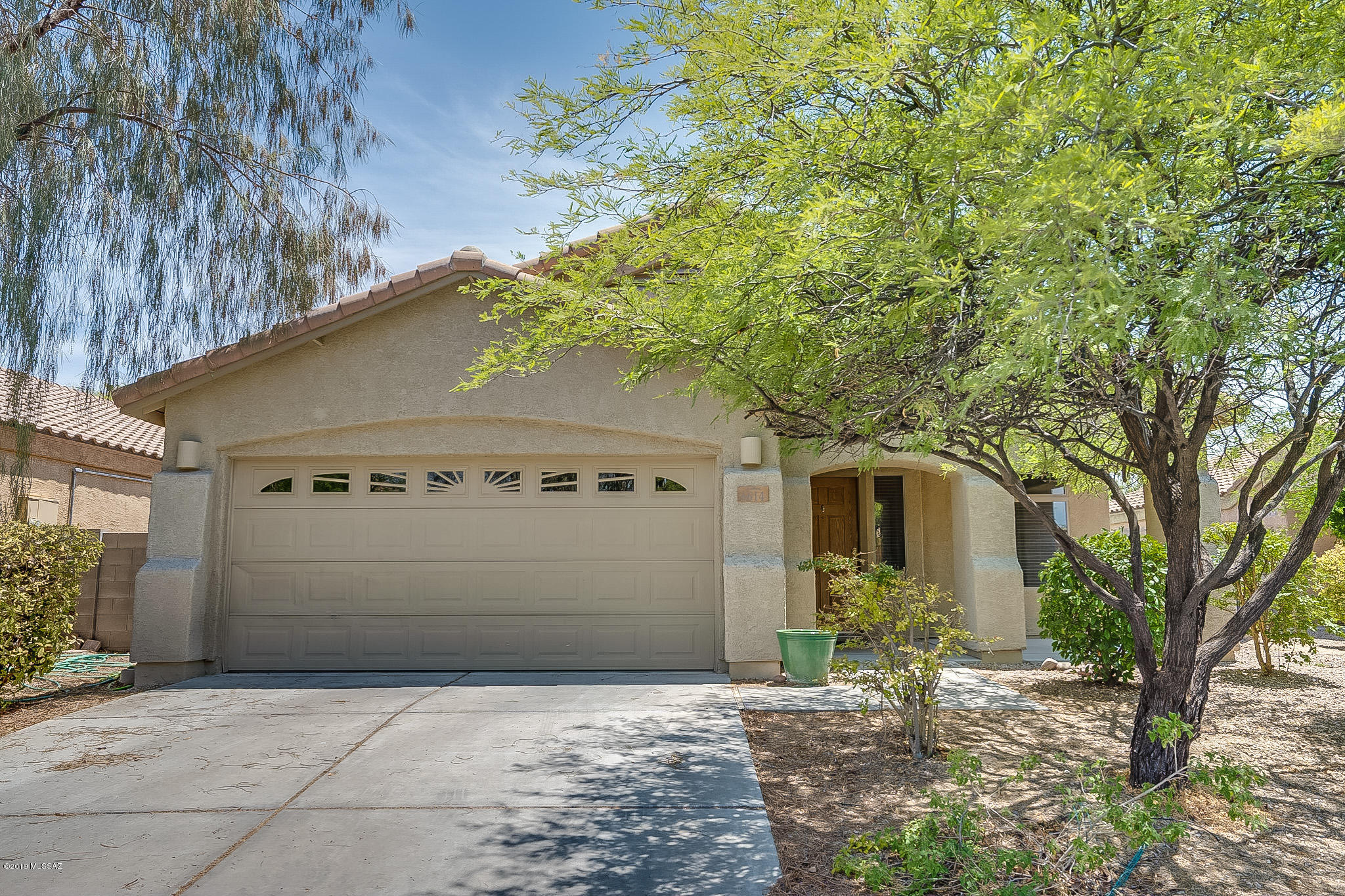 Clean, attractive, move-in ready 4-bedroom home. Located in gated community in the highly desirable Vail School District. Community recreation includes pool & spa, park, basketball court and clubhouse with weight room for the family to enjoy. Home has new carpet & pad, landscaped front & back yards and covered patio to BBQ & enjoy. Air conditioner has been newly serviced. Home has dual pane windows, 2-car garage and the current termite treatment with warranty. Convenient location near shopping & restaurants with easy access to interstate highways, International airport. Minutes to Raytheon, U of A Tech Park, Amazon & Davis Monthan AFB