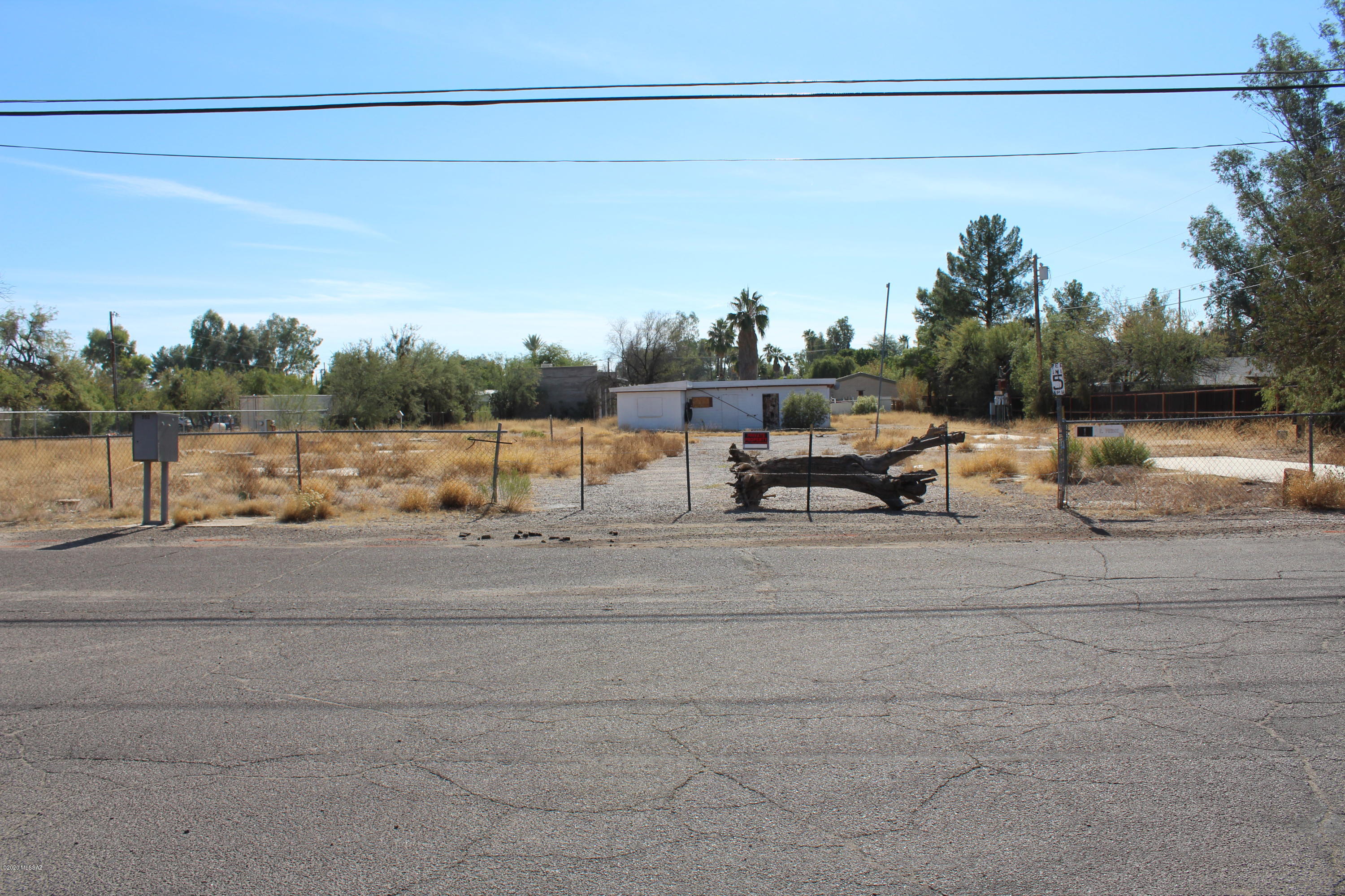 Highly Desirable Tucson Racquet Club Neighborhood! Great C1 zoned lot at the east end of Prince Rd. with incredible gorgeous panoramic views of the Catalina Mountains. Adjacent to the Rillito River Walk. Lot is graded and level on a paved street with electric, gas, water and telephone to the lot and sewer manhole in the street. This is the IDEAL in -town location for an upscale apartment complex, condo or townhome development. It would also be suitable for an office building or a retail site. One Listing Agent is related to Sellers.