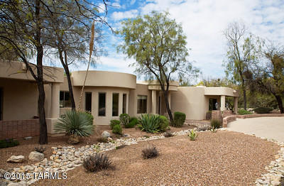 Tremendous 5 Bdrm Home in prestigous the gated community of La Paloma. Use the 5th bdrm as an office, possibly a Double Master , or for college student for a quiet retreat. This gorgeous home sits on a very private lot with great views of the Catalinas. Recently remodeled interior with great stone, tile, and Wood Flooring. Fantastic Master Bdrm suite with its own fireplace. New Stainless Appliances in the fantastic kitchen and the great Family room make this the perfect home for entertaining. Easy traffic flow onto the fantastic rear patio and yard area with spa and pool are a must see! this is perfect for Family was use and for entertaining. this home has great location near great shopping and dinning. Must SEE!