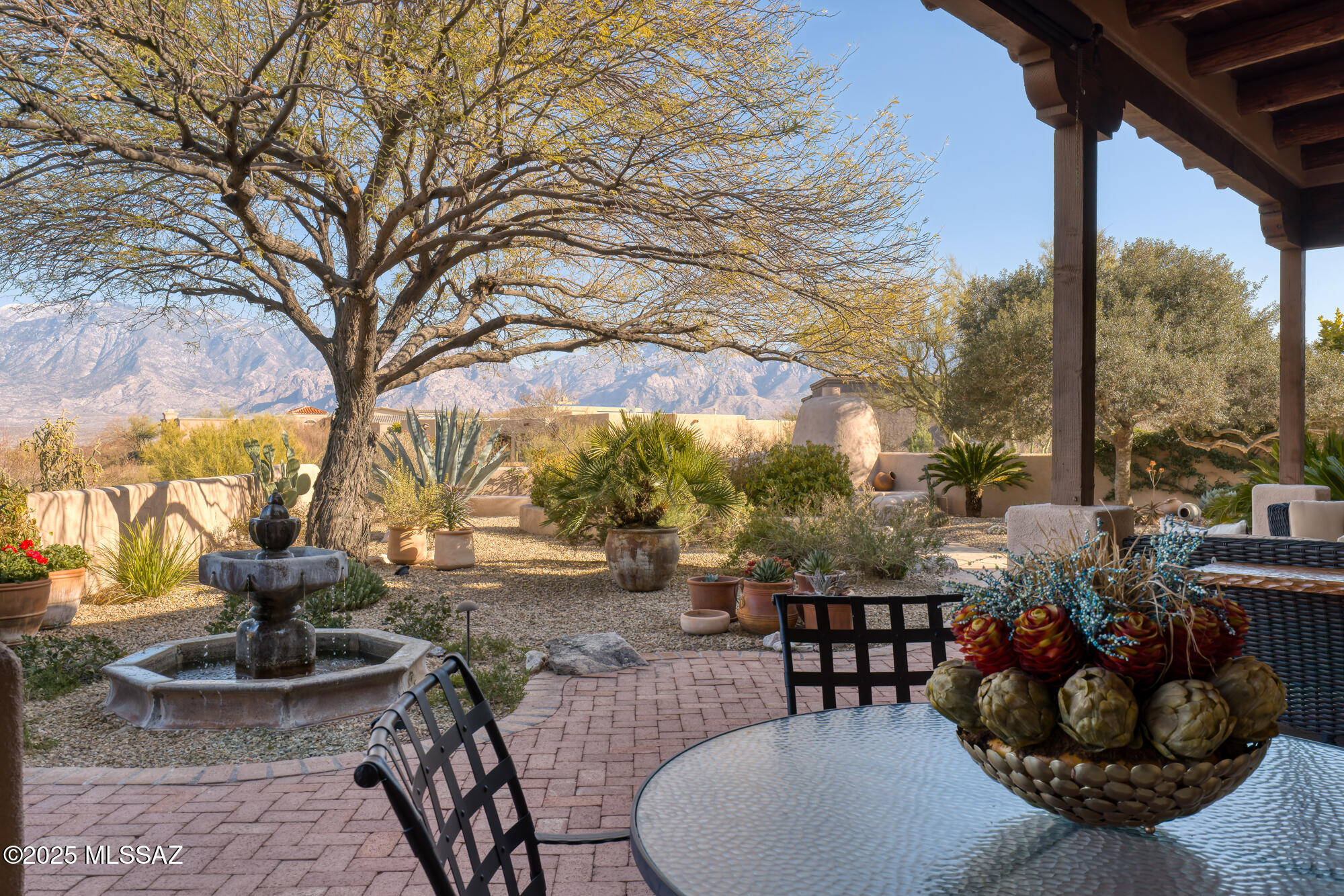 Quintessential laid-back AZ lifestyle is yours with this magical elevated setting offering stunning panoramic Catalina Mtn views in gated High Mesa! Upon entering the foyer, grand views combine with comfortable SW interior design to evoke a sense of peace and home. Designed for easy living and relaxed entertainment, this immaculate 3,196 SF home with 3BD/3BA, Den/Office, 3 Fpls & 3-Car Garage in Oro Valley's Rancho Vistoso exudes AZ charm! Gorgeous wood & viga ceilings, floor to ceiling windows, spacious patio and magical yard. Fabulous updates (see Documents for list of Improvements). True SW styling and stunning architectural elements will soothe your soul! Private cul-de-sac location with east-facing views offers true relaxation and enjoyment of the ideal and uniquely Tucson lifestyle!