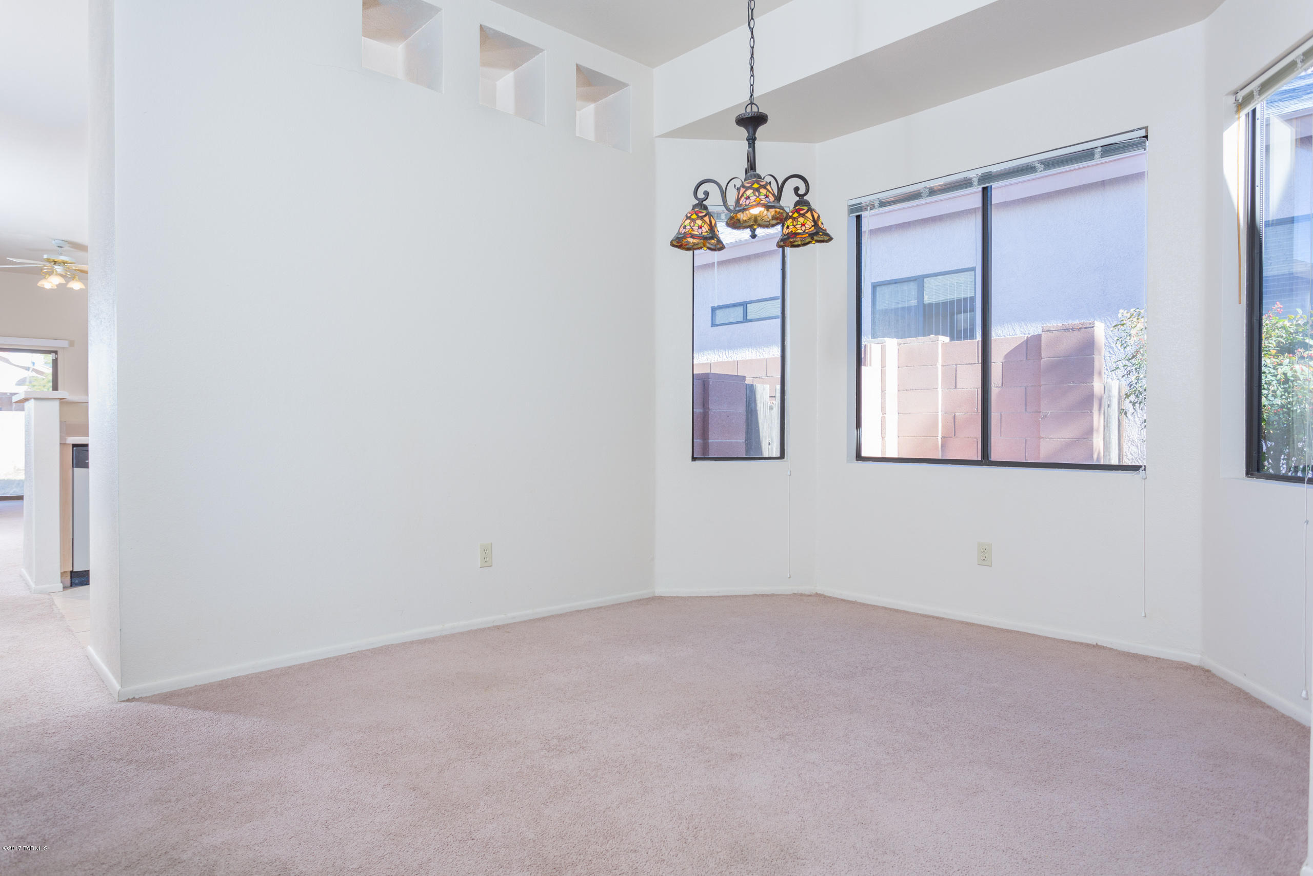 Beautiful home in Hacienda Del Oro at Rita Ranch. Move in ready This home has been cleaned and in move in condition. Close to shopping and easy access to I-10.Desired Vail school district. Washer and dryer convey as is as do blinds. Large storage shed. This home will not last be the first one in it.
