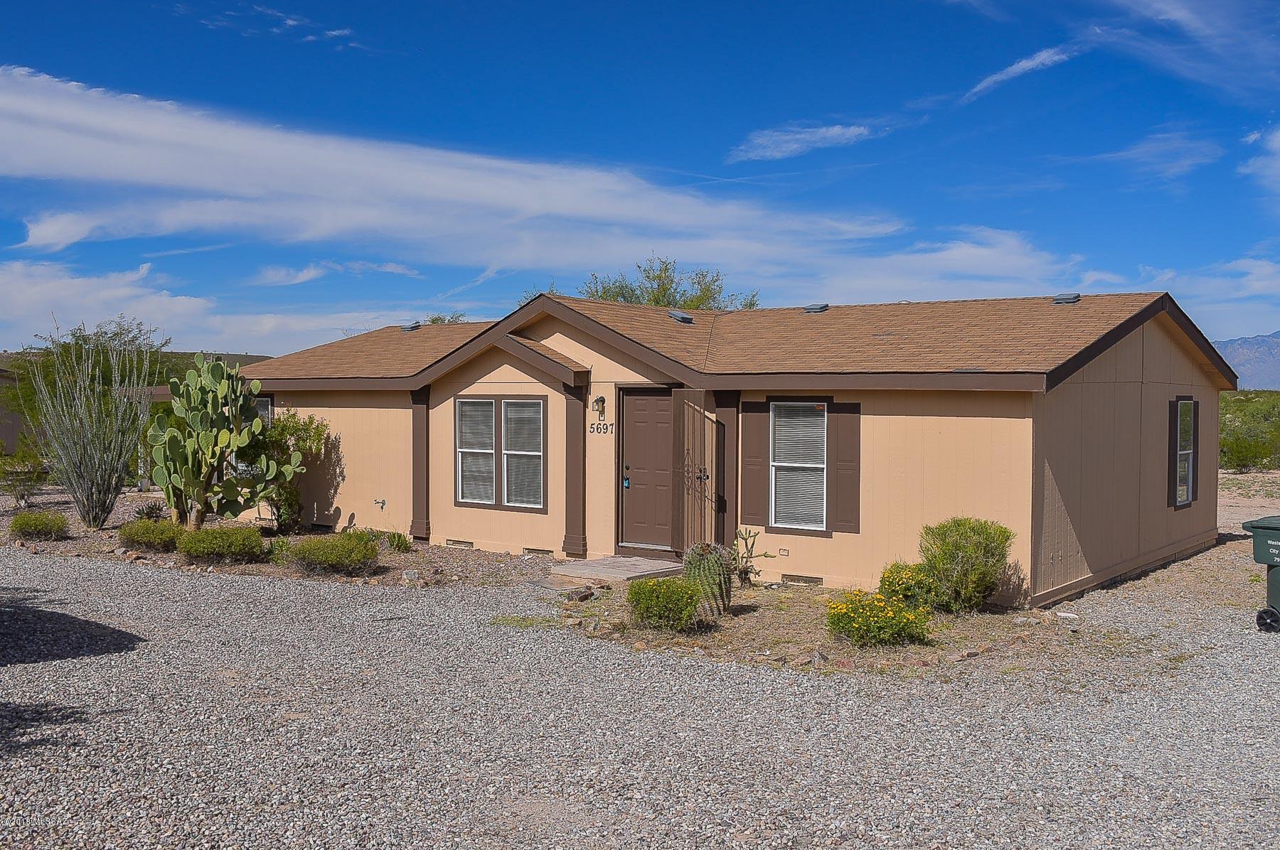 Brand new carpet! Brand new blinds and ceiling fans throughout! Brand new paint inside and out. Huge lot with fantastic Mountain and Desert views. Really nice kitchen with upgraded raised panel white cabinetry, island, and all white appliances included.