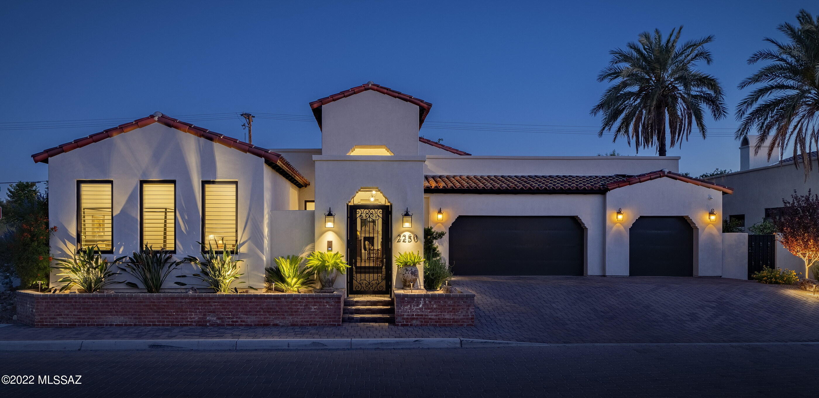 This stunning and dramatic Santa Barbara fashioned custom home offers a modern open layout and seamless connectivity between individual living spaces. Located within steps of the famed Arizona Inn (National Register of Historic Places), this exquisitely designed residence is a showpiece of architectural prowess and sophistication. Enter through your private courtyard into the beautifully appointed interiors. Soaring ceilings, opening onto the generous living and dining areas, overlooking the gorgeous chef's kitchen, complete with top-end Monogram pro series appliances, large center island, stunning Quartz countertops, breakfast bar, and pantry.
