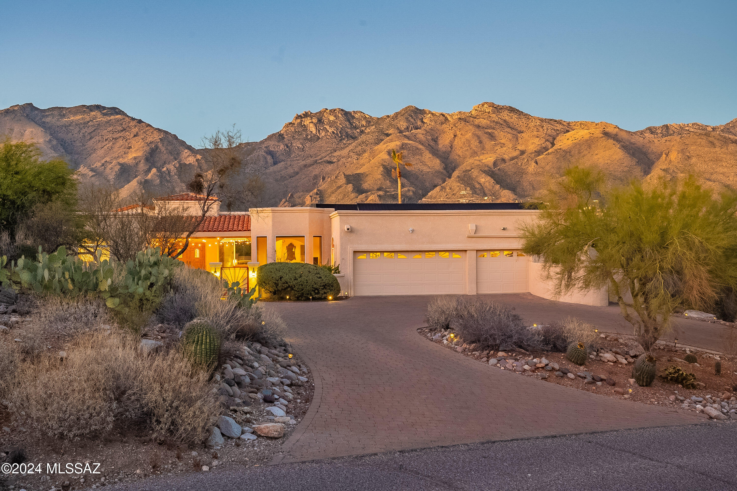 3,314 square feet of living space situated on nearly 1 acre of land providing four-bedroom, four-bathroom and a commanding mountain view, providing a serene and picturesque backdrop for everyday living.
The homeowner can enjoy the convenience of a heated pool and spa, allowing for year-round relaxation and entertainment. The home is located within the prestigious District 16 school system in one of Tucson Foothills most desirable neighborhoods.
The property is equipped with owned Solar System, offering a sustainable and cost-effective energy solution. The Smart Home technology integrated throughout the residence allows for enhanced convenience and control over various home systems.
The spacious kitchen boasts a gas cooktop, walk-in pantry, stainless steel appliances, a prep sink plus abundant counter spaces. Casual eating in kitchen or in Formal Dining, each with the showstopping Catalina Foothills view. Multiple gathering spaces throughout the home offer ample room for entertaining and hosting guests.
Enjoy an oversized, epoxy floored, 3-car garage with additional workshop space within the for the tinkerer.
The property's Cimarron Foothills Roving 24/7 manned security provides an additional layer of safety and peace of mind. An ideal setting for those seeking a luxury lifestyle surrounded by the natural quite beauty of the mountains while being between some of Tucson's best golfing, hiking, shopping, and foodie scene. Resort living every day! Professional Photos will follow.