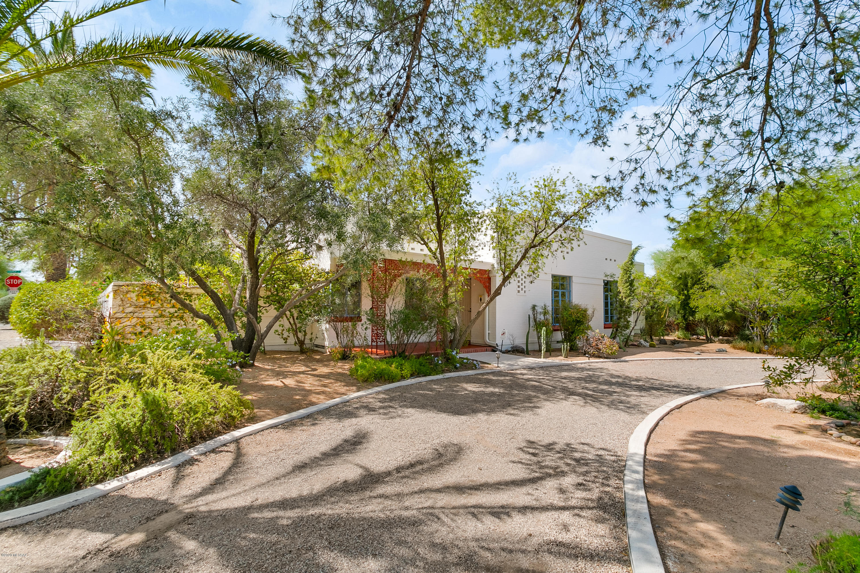 Historic 1937 Art Moderne home in lovely San Clemente neighborhood. Fantastic house for entertaining. Huge living room with grand fireplace and original crown molding. Seat 20 in the almost 14' by 23' dining room. Second fireplace in family room and sun room that opens to a lush outdoor courtyard with solar heated pool.  Through the kitchen is a separate but connected guest area with 2 bedrooms, bathroom and kitchenette. 2 car garage. Solar installed in 2018.  Alarm system owned. Zoned cooling. Flexible floor plan allows for multi-generational living or rental income.