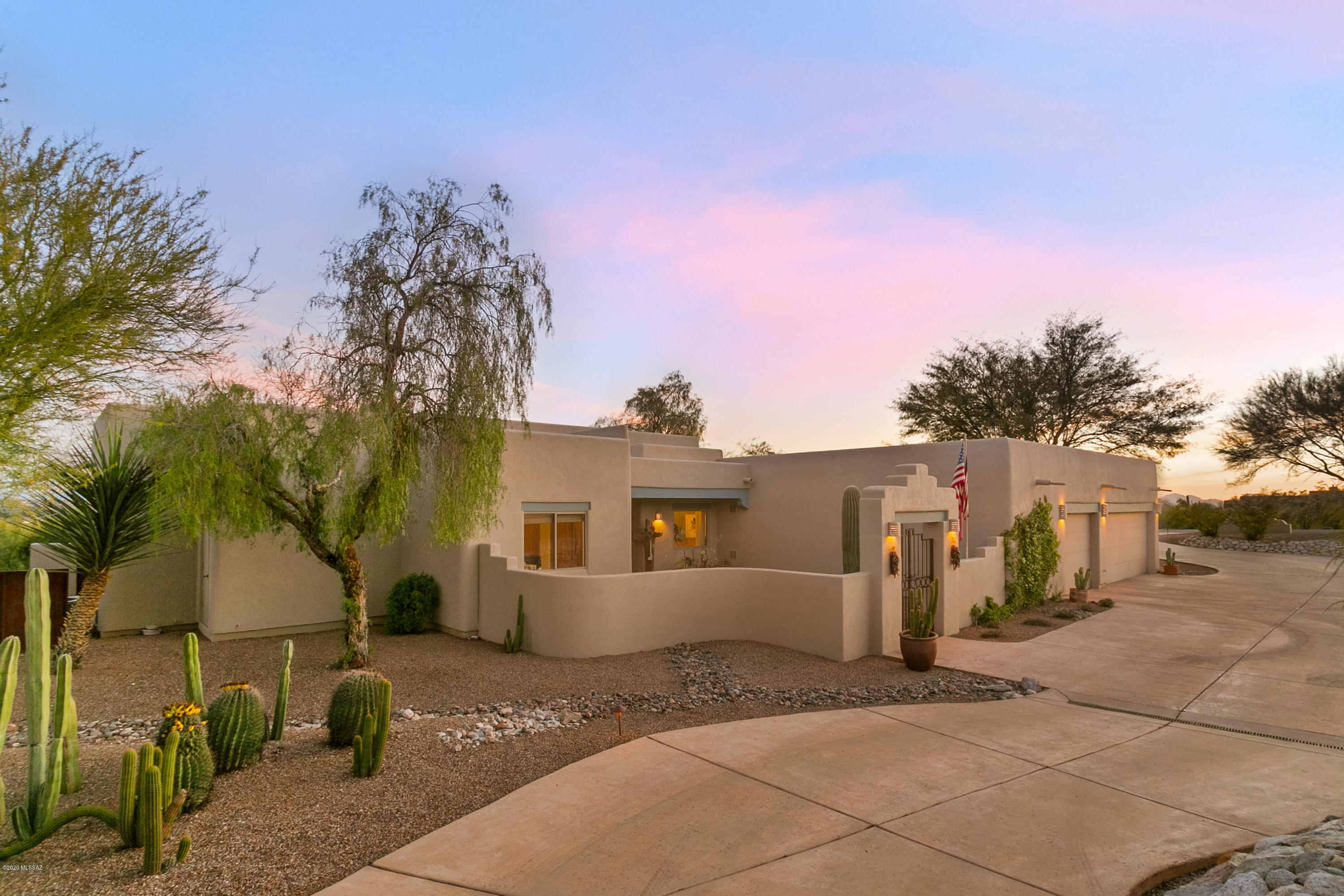Welcome to Green Ridge! Located in an exclusive, gated community of only 38 homes, this beautiful southwestern style property features a 4 bedroom/2.5 bathroom split floor plan, and is situated on 1.64 acres. Saltillo tile throughout, custom interior paint, and high ceilings with exposed viga beams truly brings this Tucson home to life. Additional distinctive characteristics include a 3-car garage with a dedicated workshop area, front courtyard entry, and mature desert landscaping. 

Relish the remarkable views of the Rincon Mountains and Tanque Verde Valley from the full length covered patio - and enjoy a dip in the Pebble Tec pool & spa.

Contact us to schedule your private showing.