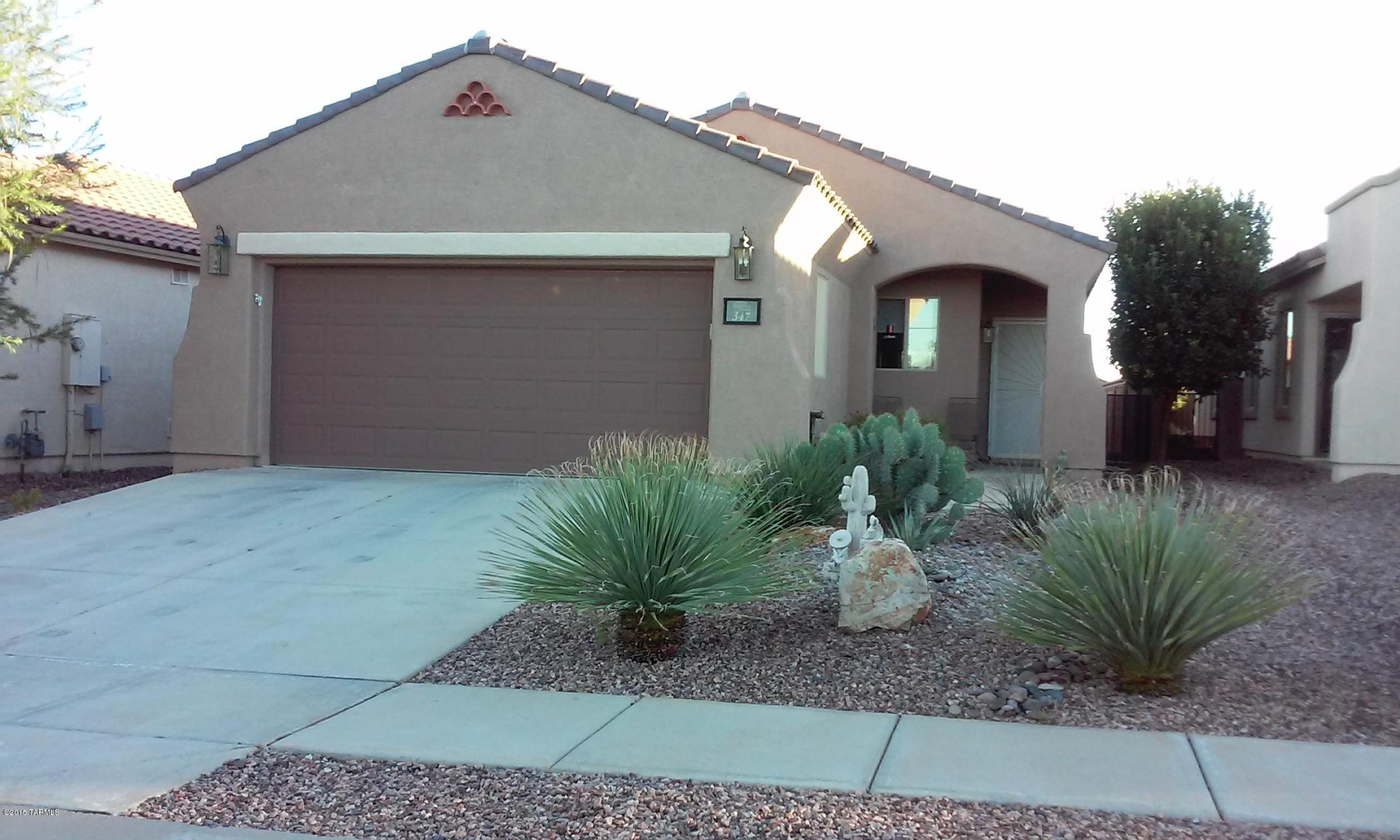 Located in Sonora Dell Webb's 55+ adult community located in the heart of Rancho Sahuarita.This beautiful 3bdrm 2ba home is move in ready. Enter and be impressed with beautiful tile flooring. The two guest rooms feature wall to wall carpeting. The spacious master bdrm includes bay windows, large walk-in closet and dual vanity bath. Kitchen features include Corian counter tops, Cherry finished cabinets, pantry,stainless steel appliances, ceiling fans through out, dual pane low E windows and sun screens on west exposure windows. Two car garage with epoxy coated floor. Hoa includes use of  Sonora community pool/spa, Fitness center clubhouse as well as Rancho Sahuarita family water park pools, parks and lake. Furniture in home conveys. 5yr maintenance warranty 
on heating and ac sys. convey