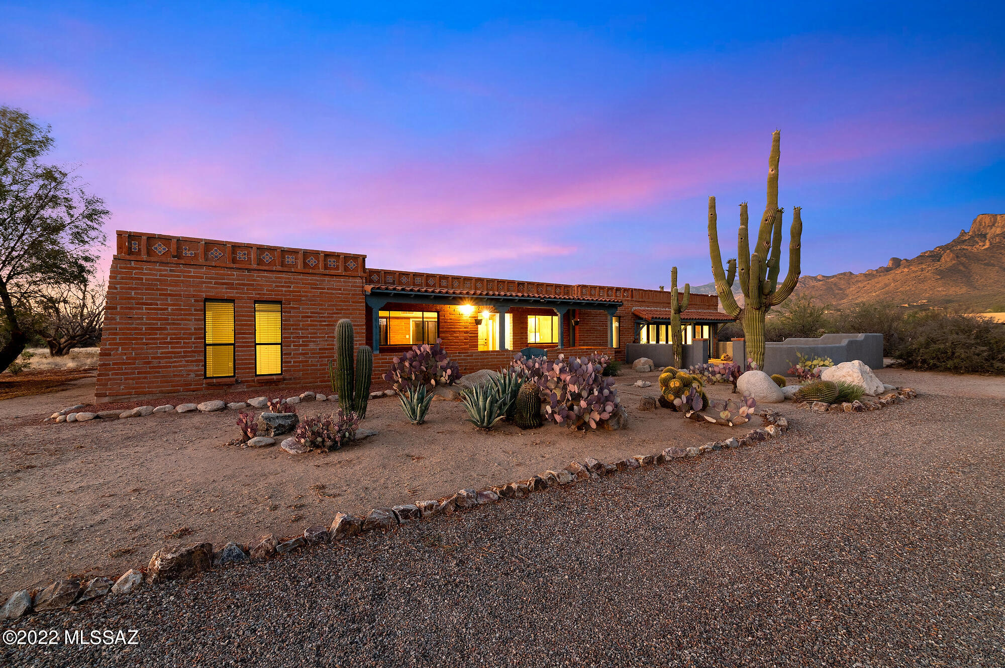 Welcome to this fabulous ranch style adobe brick home located on a spacious lot of 4.65 acres! You will enjoy the luxury of extensive privacy! NO HOA!! Enjoy mountain views with beautiful desert landscaping. This home features 4 bed, 3 bath with a large family room, dining area, second living space with fireplace and a pool. The dining room is perfect for entertaining. Kitchen features new SS appliances, farmhouse sink, quartz counters & a large kitchen island. Master bedroom suite has walk-in closet, custom shelving, & beautiful master bath with double vanity. Beautifully landscaped backyard. Additionally, the Seller has preliminary plans for garage and accessory building. And this property has city water plus a Water WELLl! THIS IS A MUST SEE!!