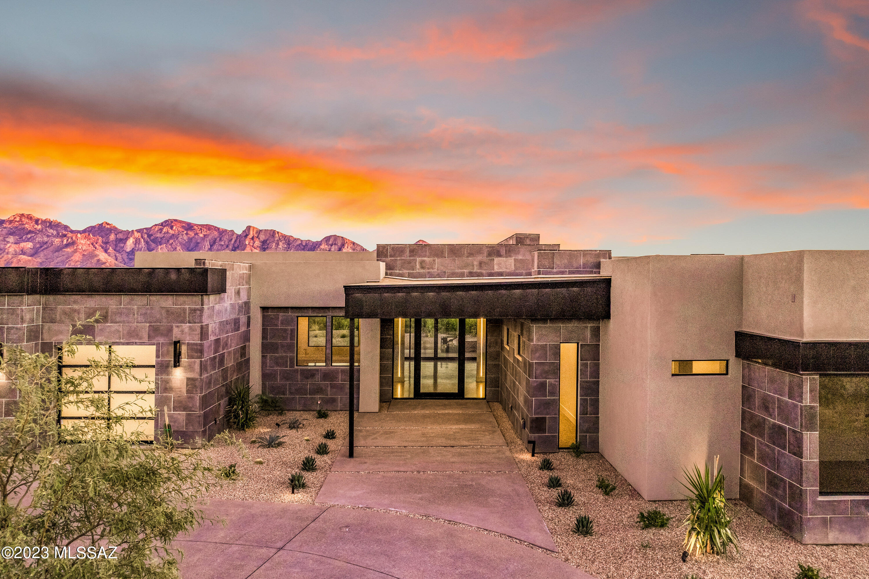 MOVE INTO YOUR DREAM HOME NOW! Enjoy entertaining in your new home with spectacular Catalina Mountain views throughout. With an abundance of natural light & a layout for easy living & entertaining, the floor plan includes a large multi-slide rear door, dramatic high ceilings, double island kitchen with all Thermador appliances & a separate bar off the great room with Sub Zero wine refrigerator. Optional 602 sf Guest House already designed. Enjoy resort like living in the private community of Stone Canyon with World Class Golf Course designed by Jay Morrish & ranked in the Top 100 Golf Courses in America.