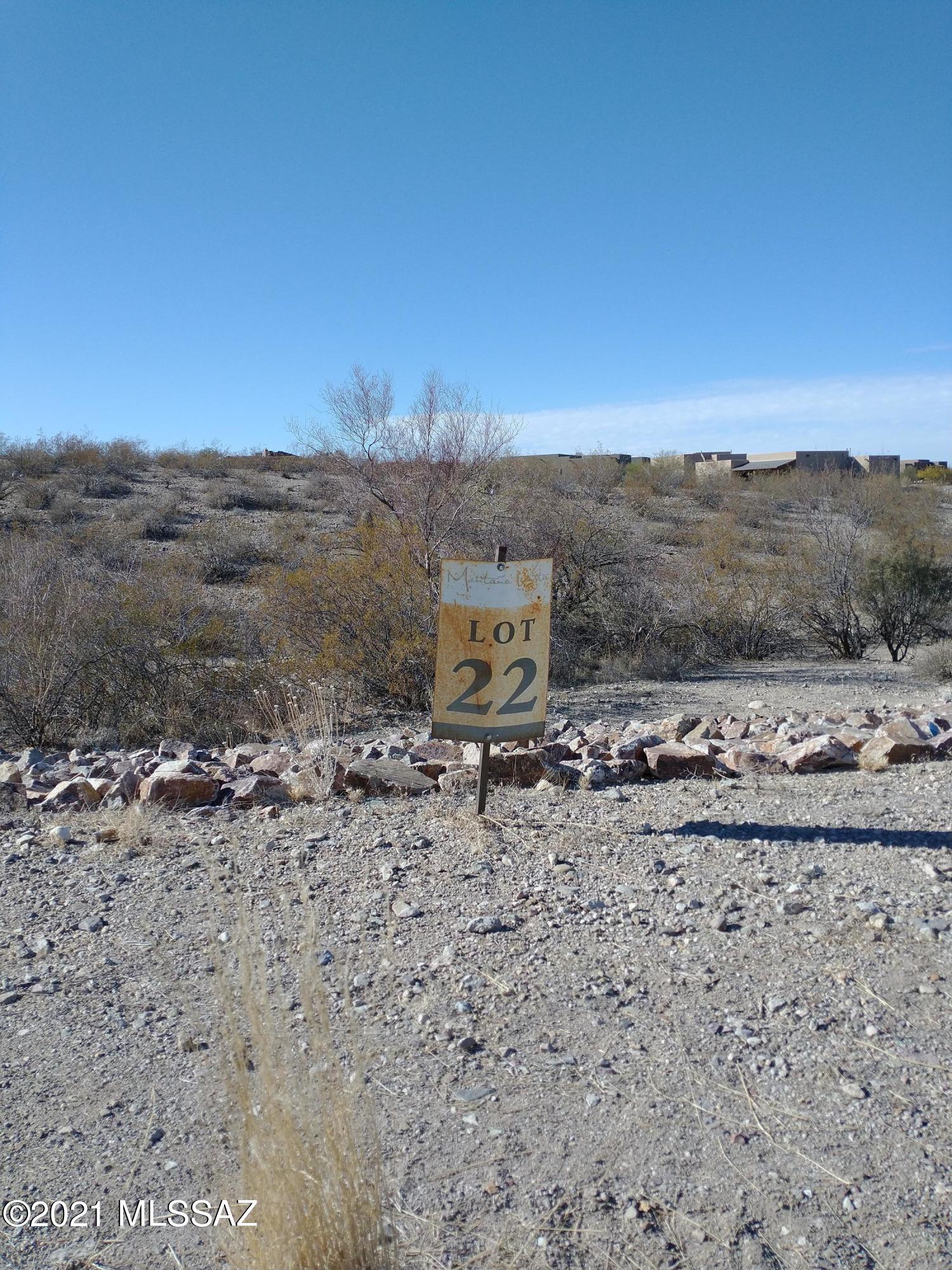 Beautiful raw land on 1 acre lot, buffered from close neighbors.  Public water and gas at lot line. Beautiful views of the Catalinas and the Tucson Mountains at this cul-de-sac lot, seconds from downtown, central and I-10. The West side is the best kept secret in Tucson. Build to suit or pick from builder provided floor plans or buy land and save for building later. High ceilings and spacious living with lots of extras and options from this high-end custom home builder with impeccable integrity.
