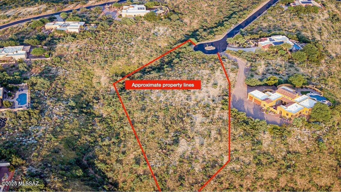 Stunning 2.61 acre lot in gated & desirable Green Valley community of Madera Foothills Estates. This cul-de-sac lot offers amazing views in every direction & privacy. Build your dream home on this large parcel and still be close to everything Green Valley has to offer. Community is part of the Green Valley Recreation.